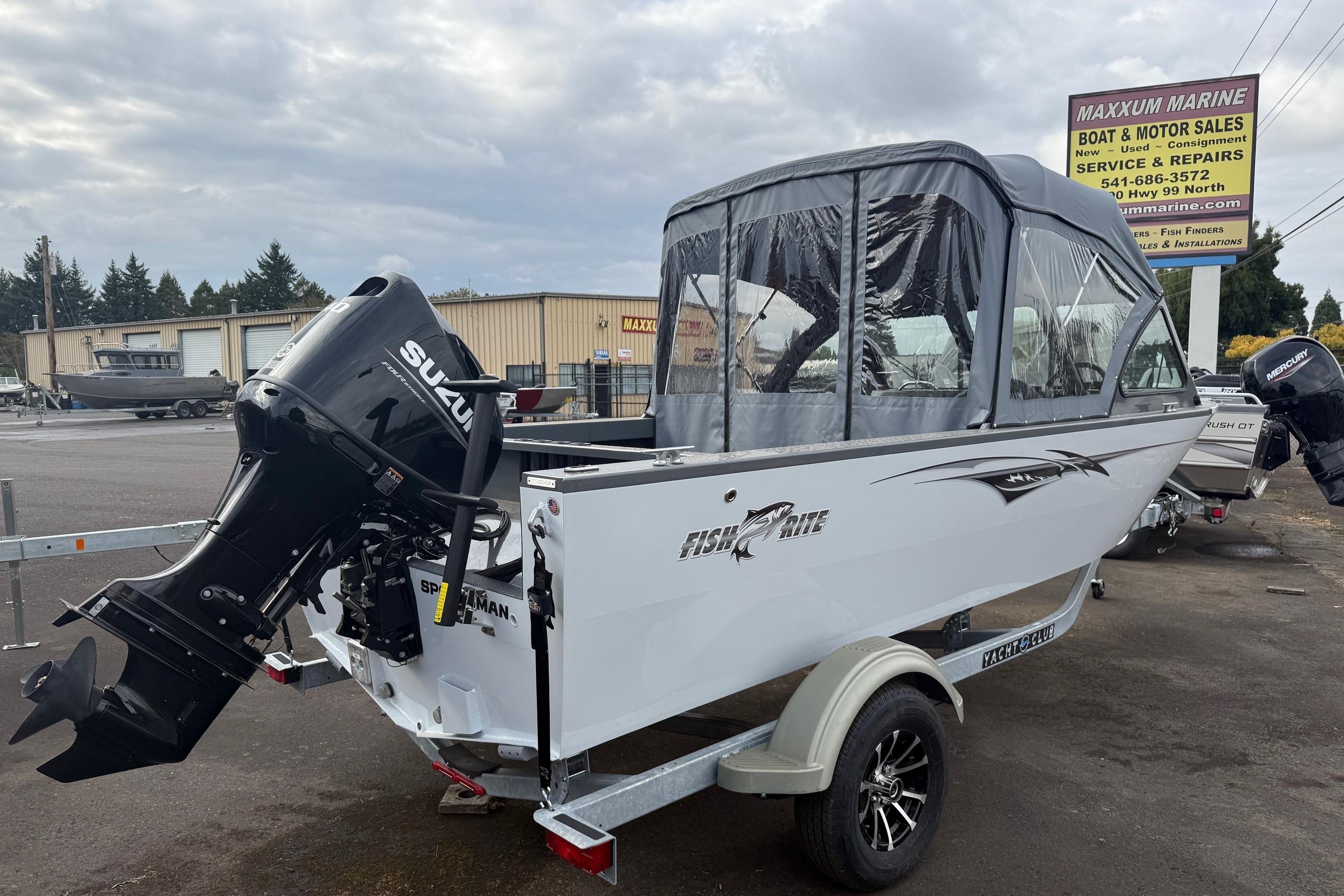2026 Fish Rite Sportsman 20 boat with Suzuki outboard motor at Maxxum Marine dealership.