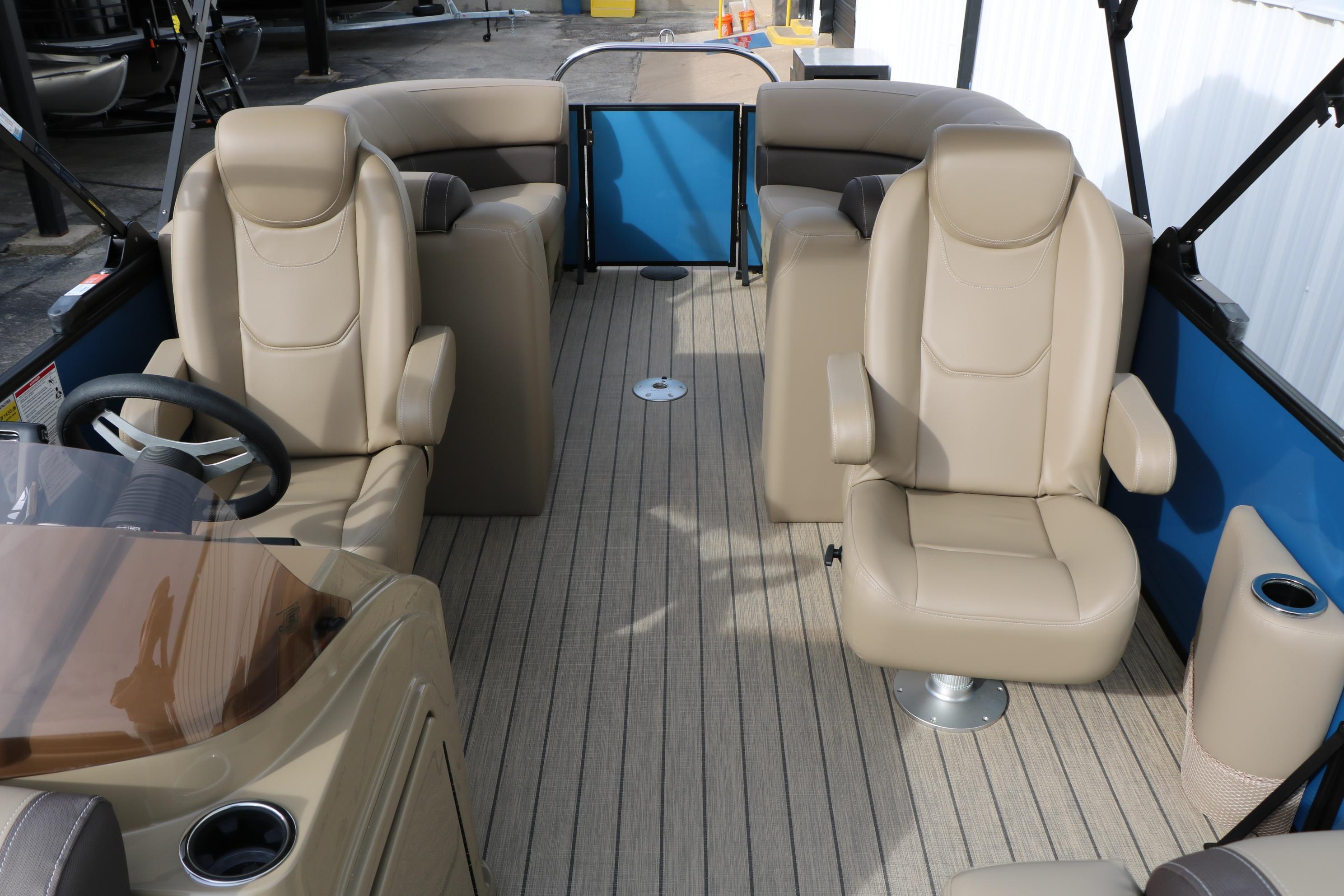 2026 Sylvan Mirage 822 LZ pontoon boat interior with beige seating and modern design.