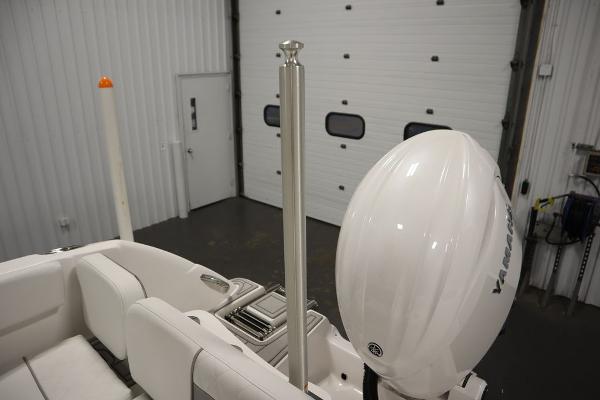 2025 Sea Fox 228 Traveler boat interior with Yamaha engine in a garage.