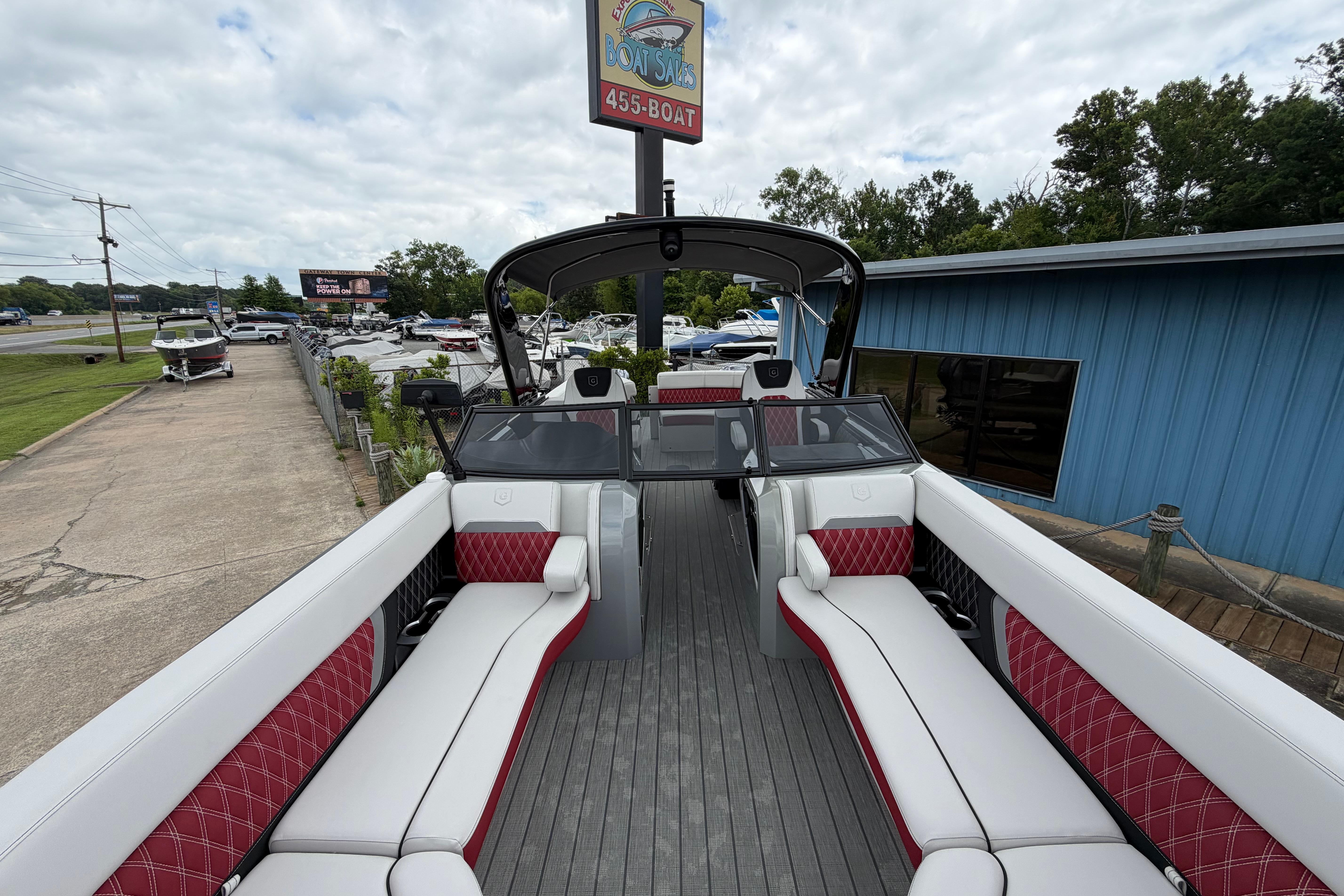 2023 Godfrey Sanpan 2700 ULW Twin pontoon boat with luxurious seating and modern design.