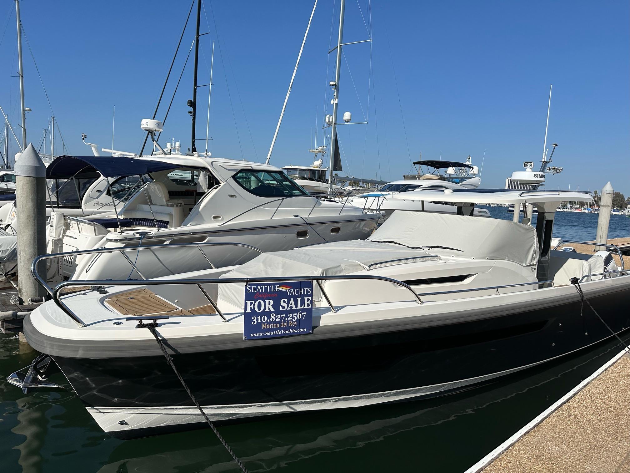 2023 Nimbus T11 boat for sale at marina, featuring sleek design and modern amenities.