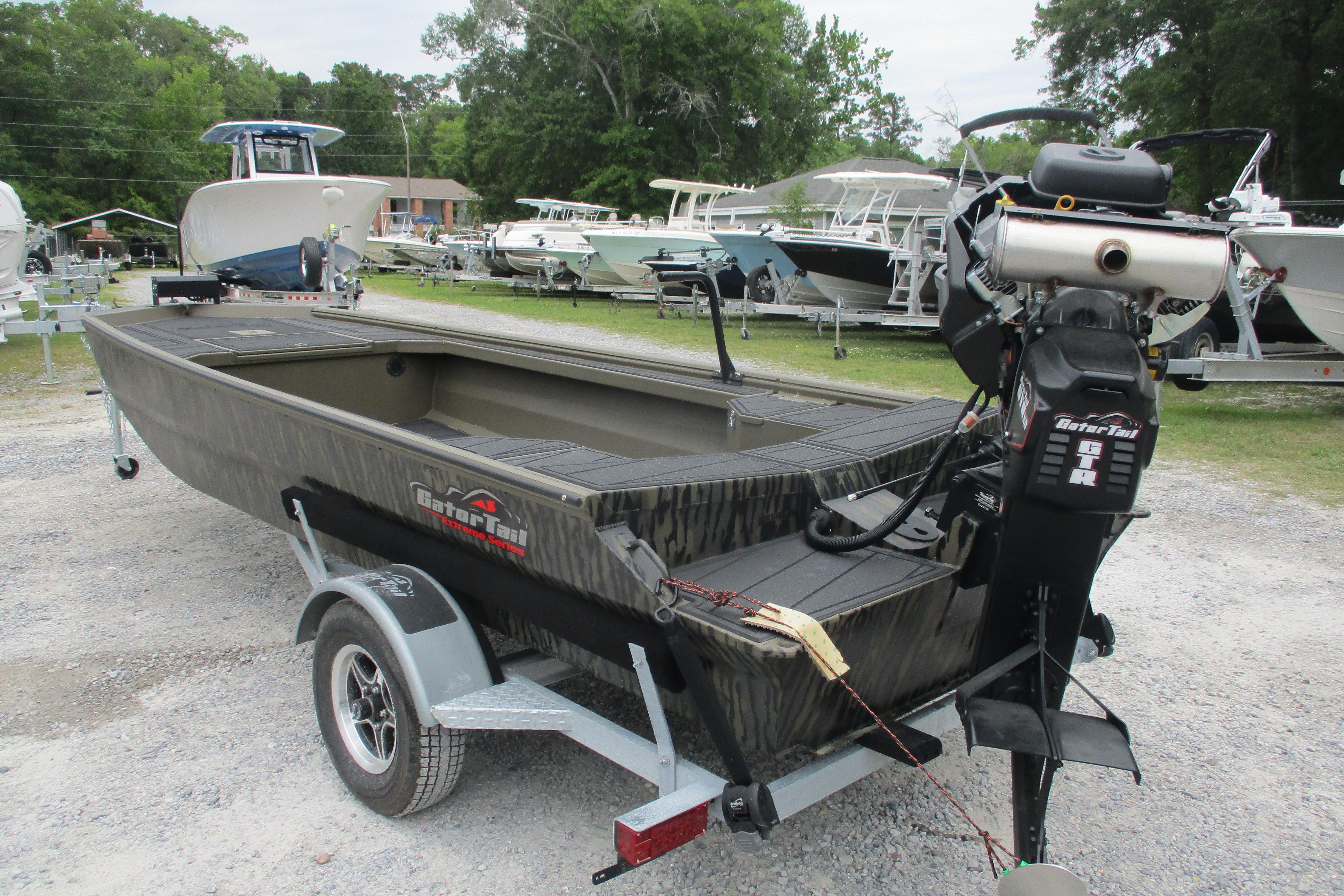 2026 Gator Tail 1854 Extreme boat on trailer, surrounded by other boats.