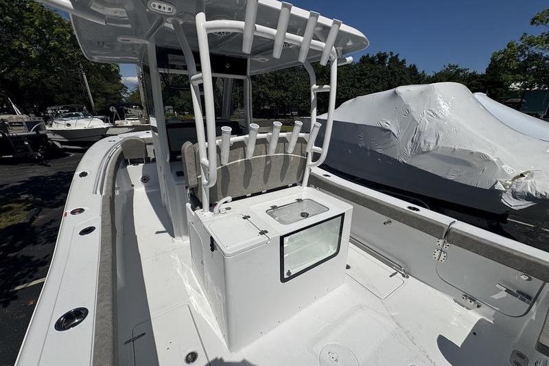 2026 Sea Hunt Gamefish 30 Forward Seating boat with rod holders and center console.