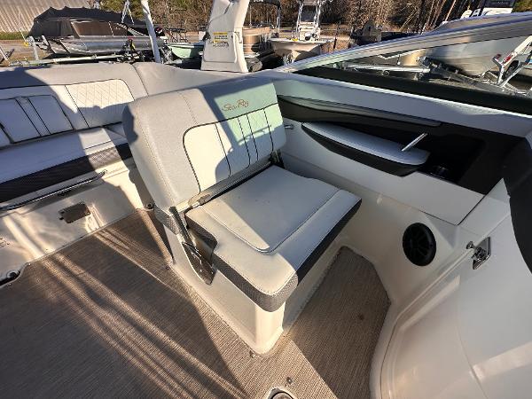 2016 Sea Ray 240 Sundeck interior with cushioned seating and modern design.