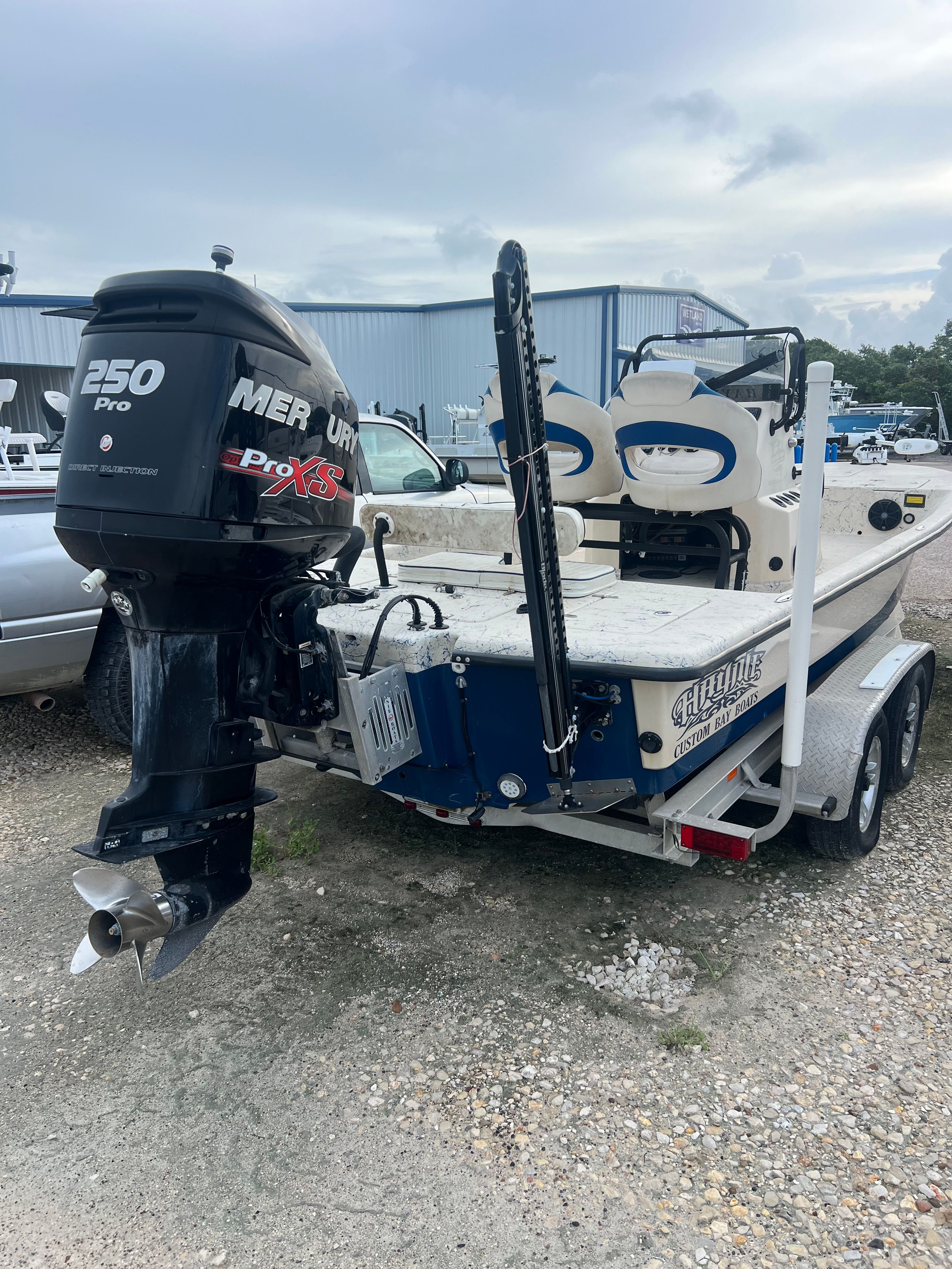 A 2014 Haynie ho boat with a Mercury 250 Pro XS outboard motor.