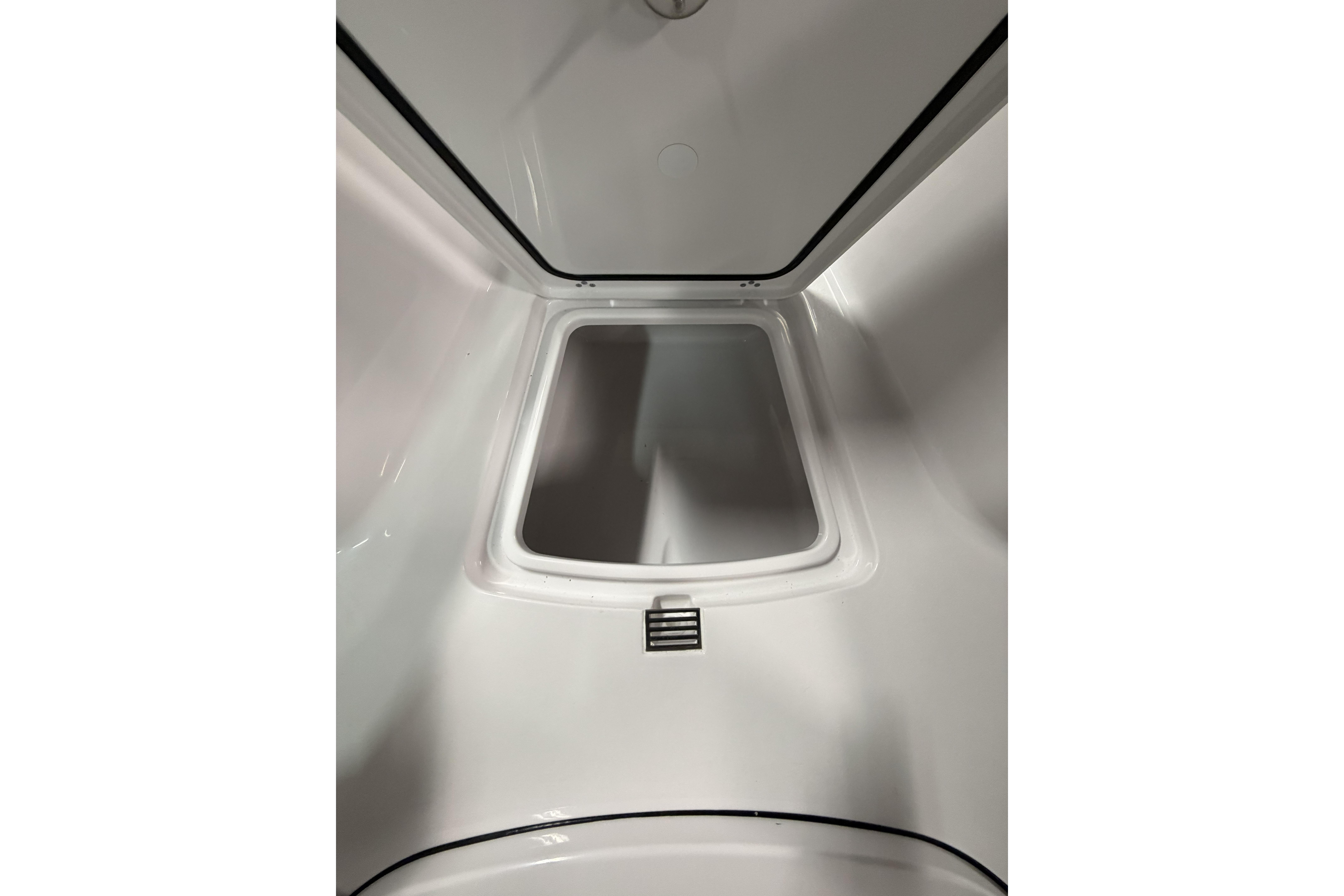 Interior view of 2026 Sportsman Open 232 Center Console boat compartment.