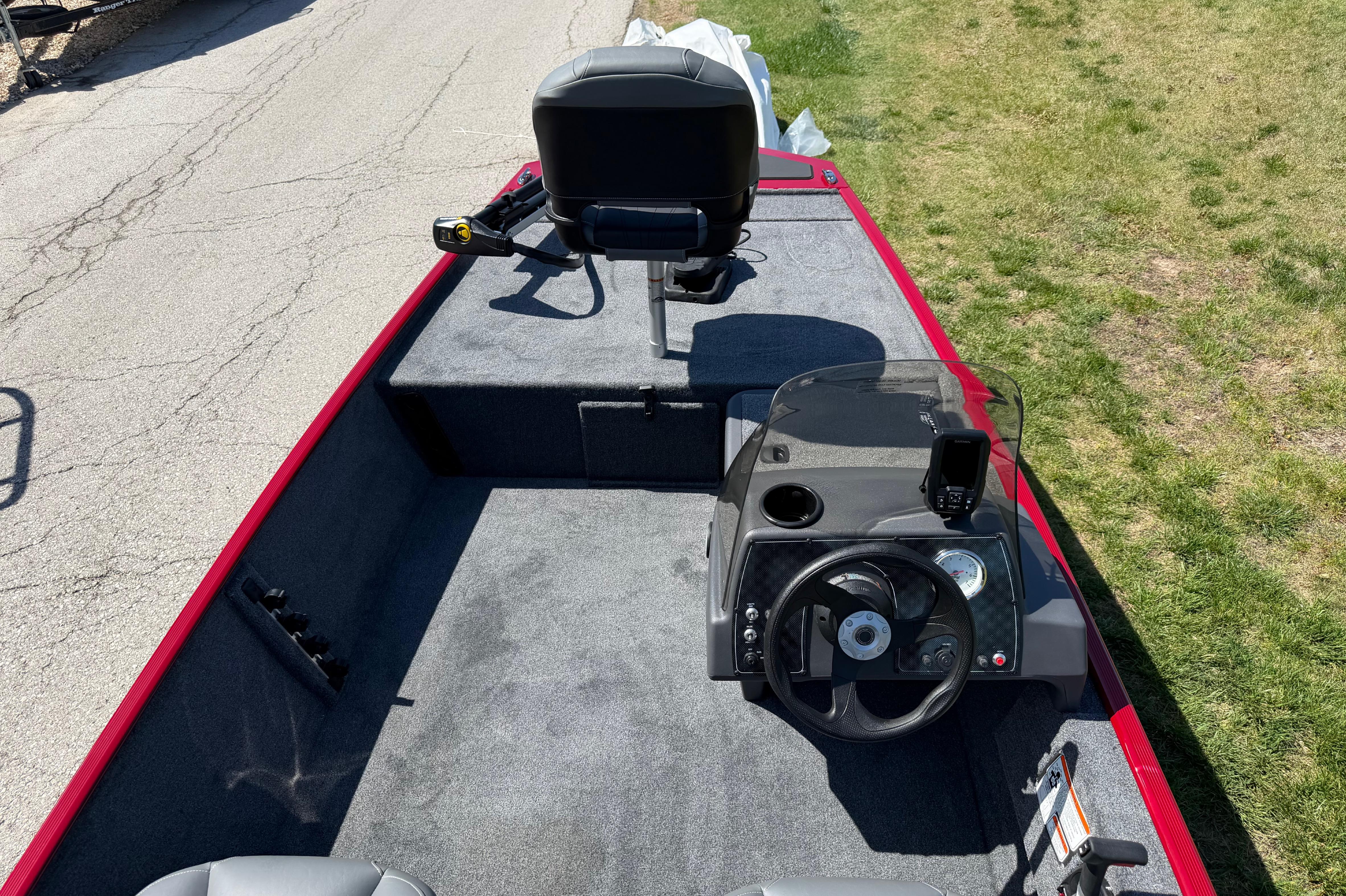 2026 Tracker Bass Tracker Classic XL boat interior with steering console and seating.