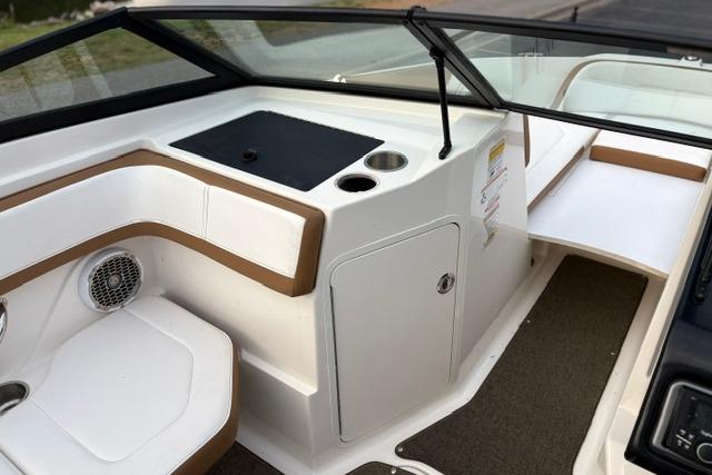 2017 Searay SPX210 boat interior with seating, storage, and cup holder.