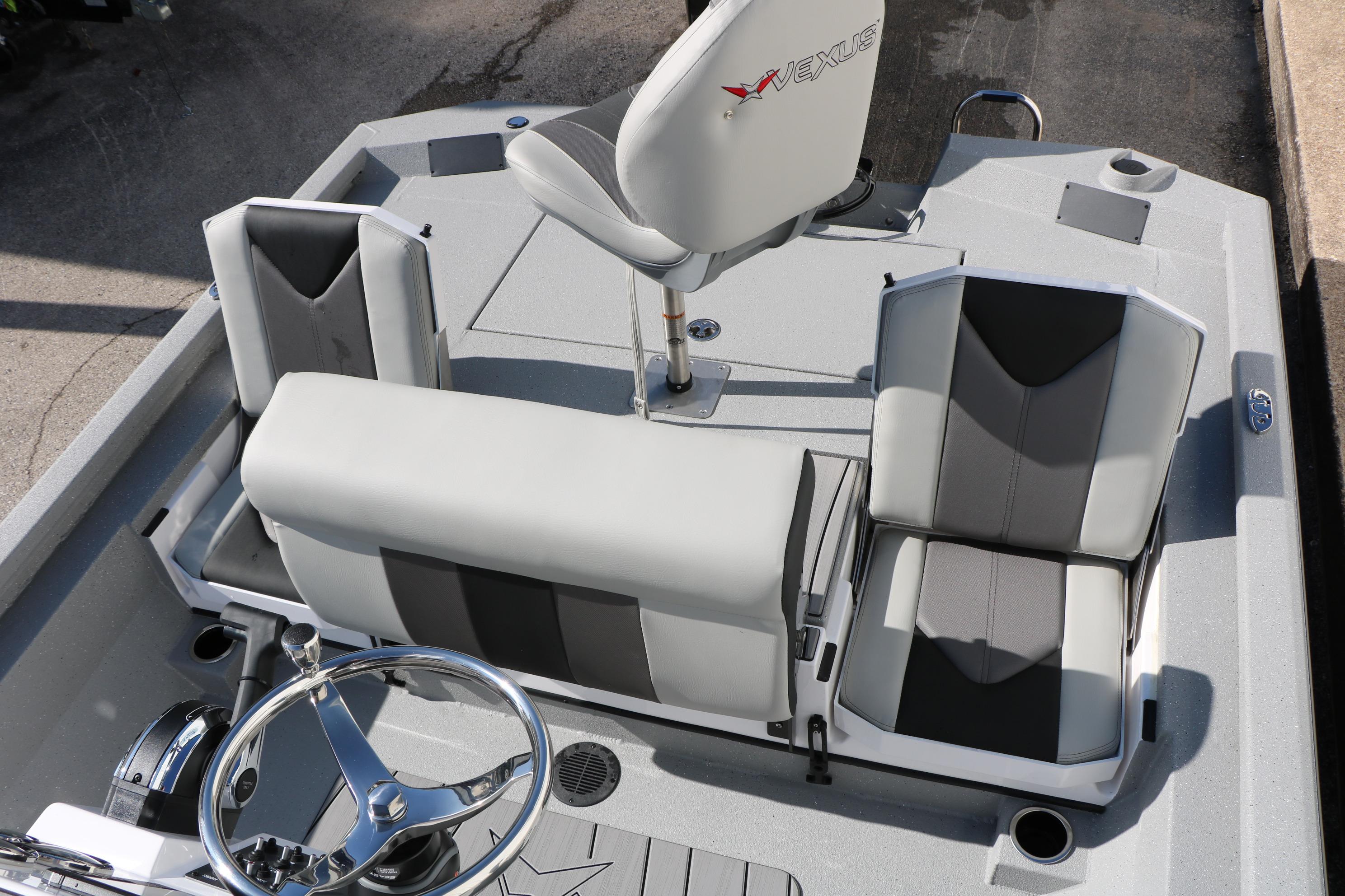 2026 Vexus ACX2000 boat interior with gray seating and steering wheel.