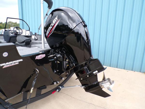 2025 Tracker Pro Guide V-175 Combo boat with Mercury outboard motor, side view.