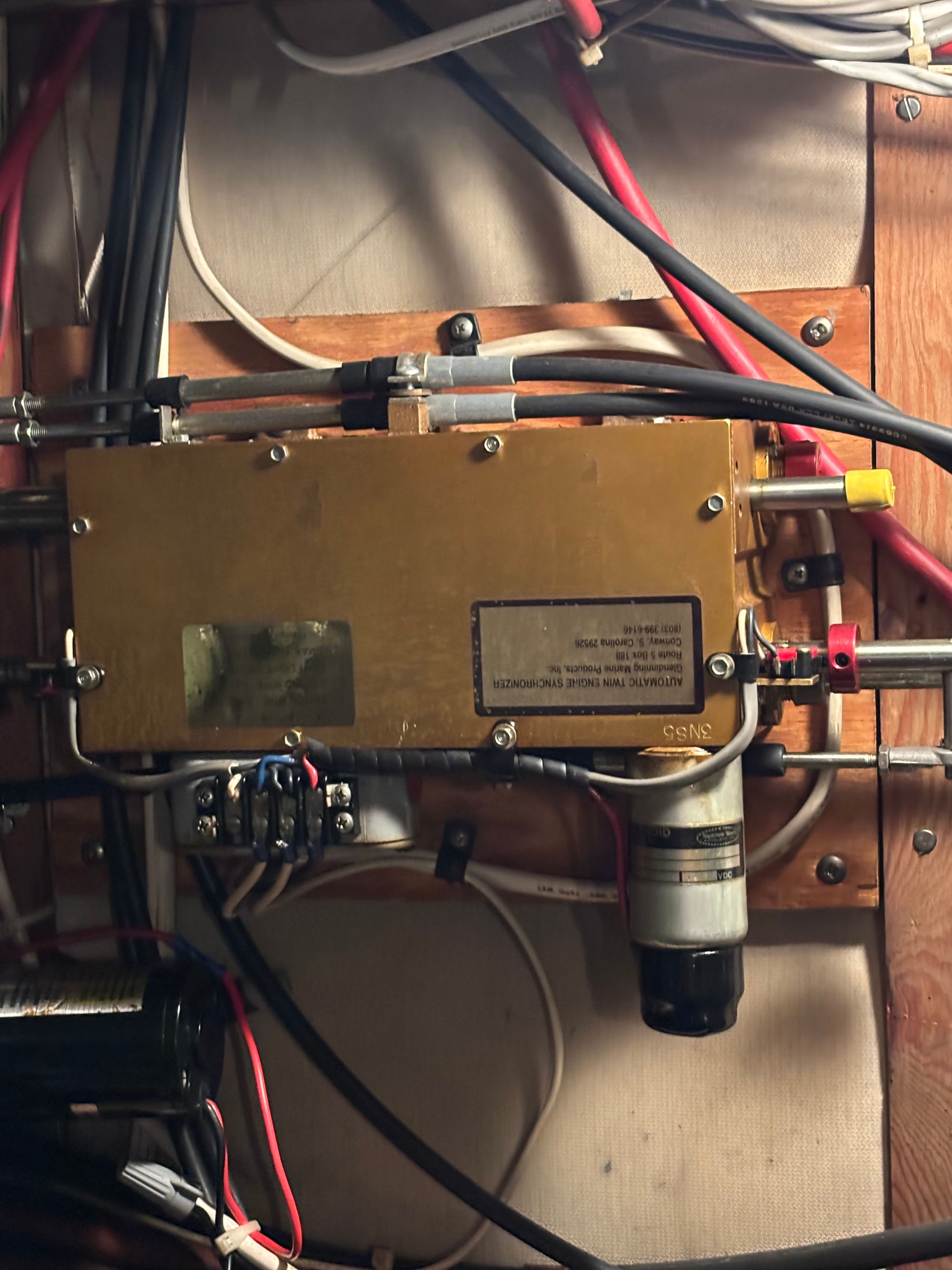 Electrical panel with wiring inside a 1977 Bertram 42 Motor Yacht.