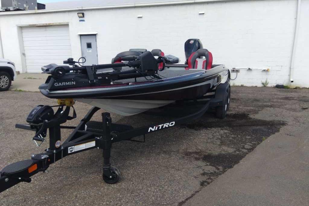 2026 Nitro Z20 XL Pro fishing boat on trailer, parked outdoors.
