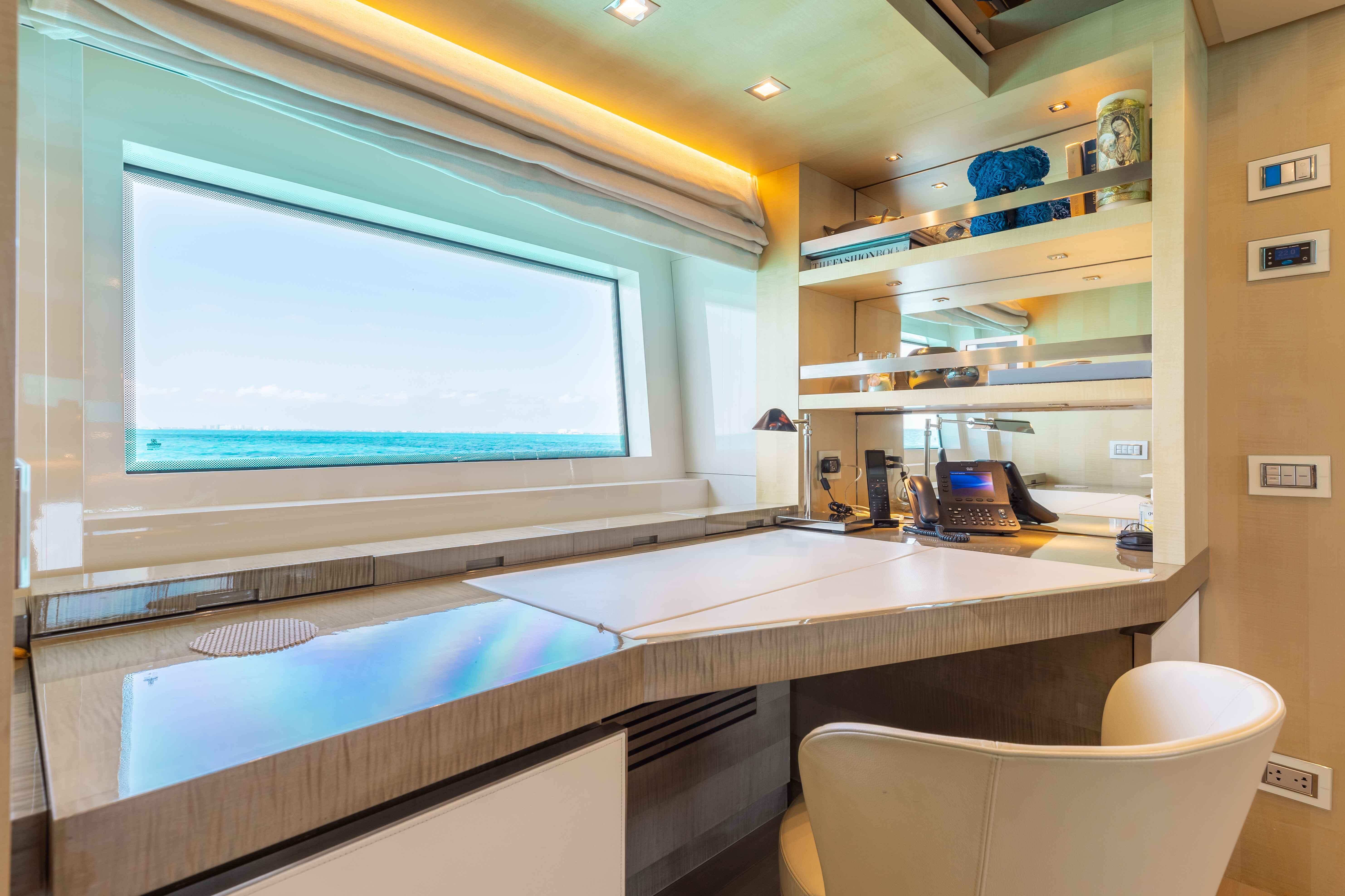 Luxurious office space on the 2016 Sanlorenzo SD126 yacht with ocean view.