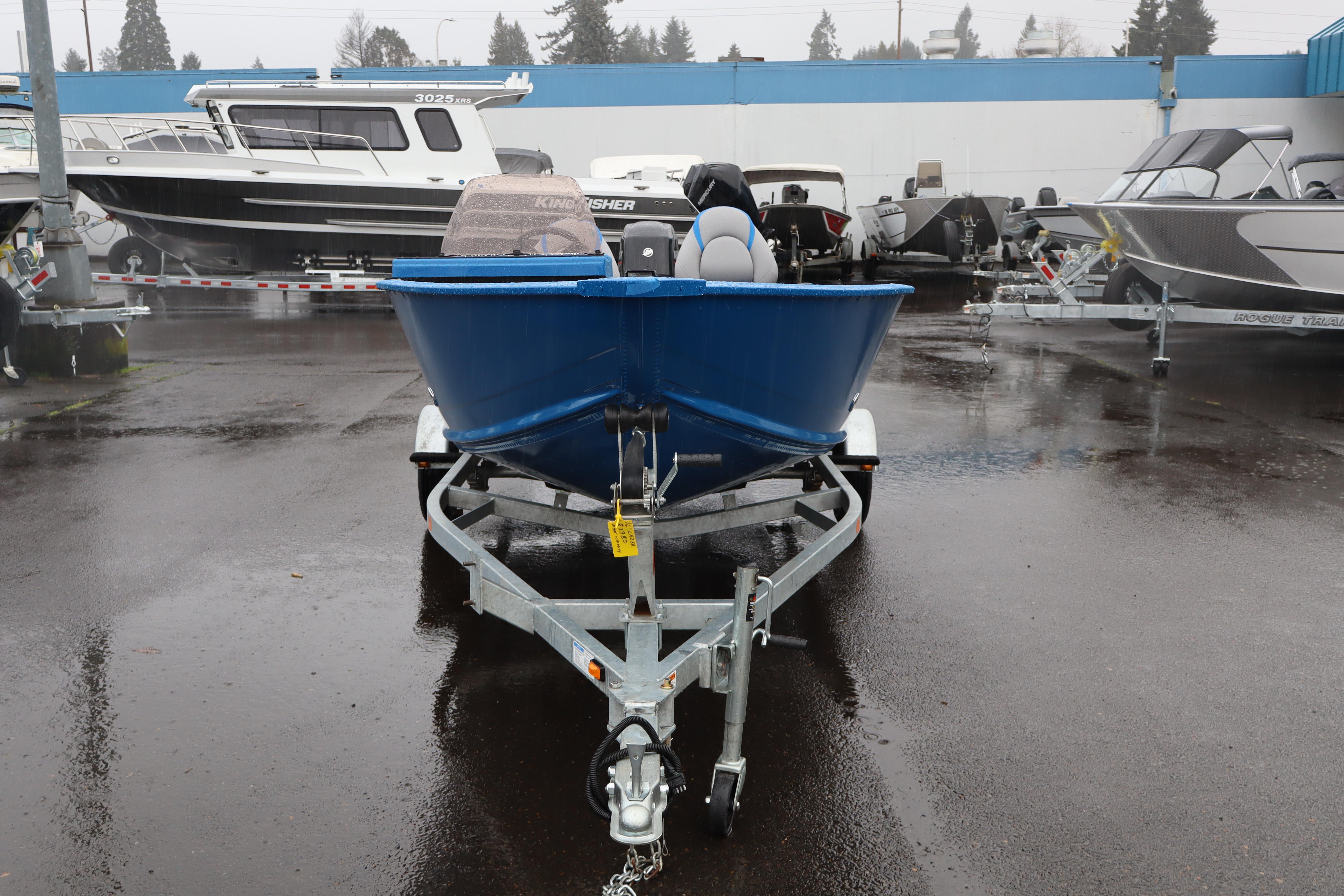 2026 Smoker Craft Lazer 161 boat on trailer in a dealership lot.