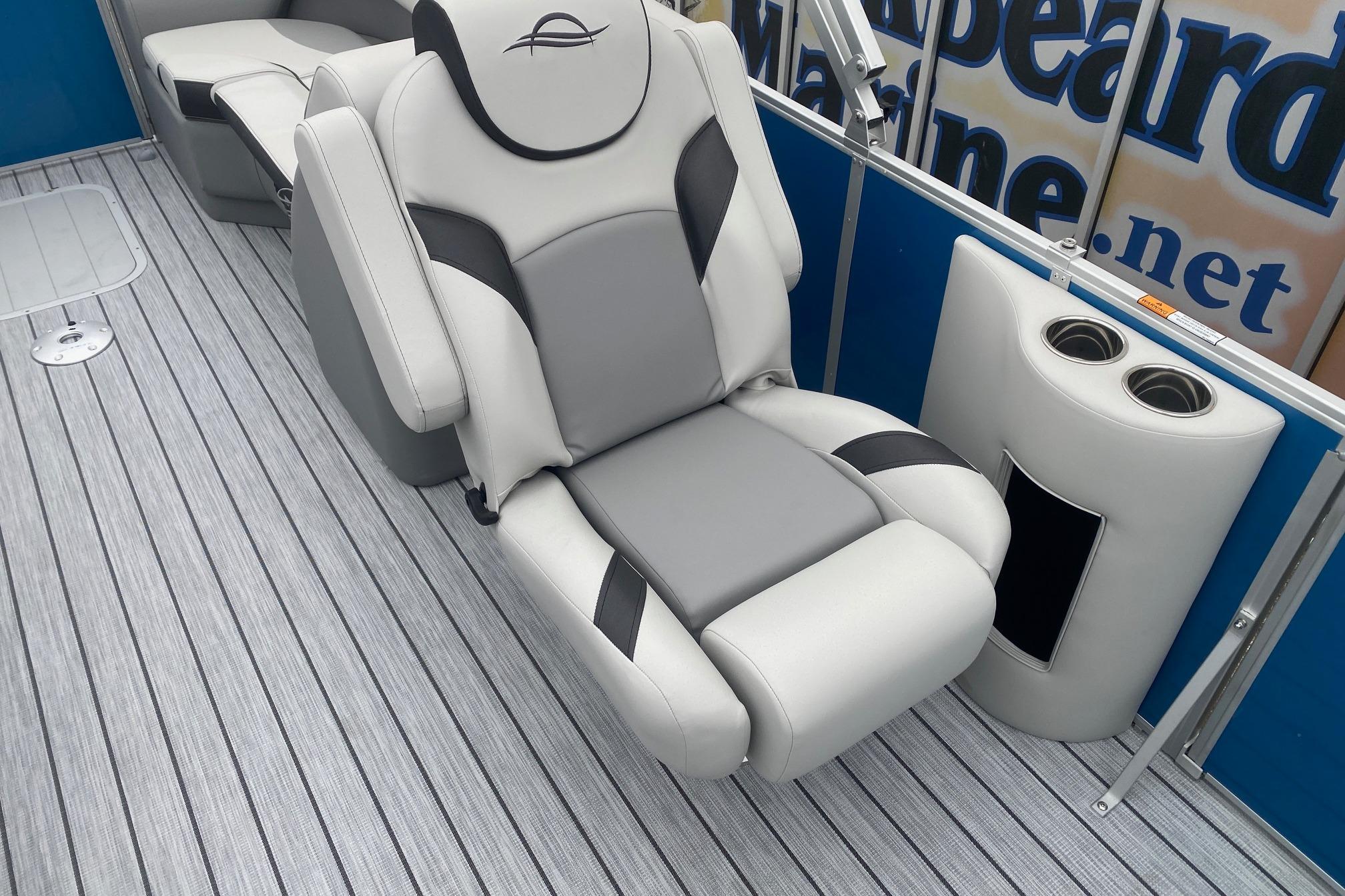 Luxurious seating on 2026 SunCatcher Select 322RC boat with cup holders and sleek design.