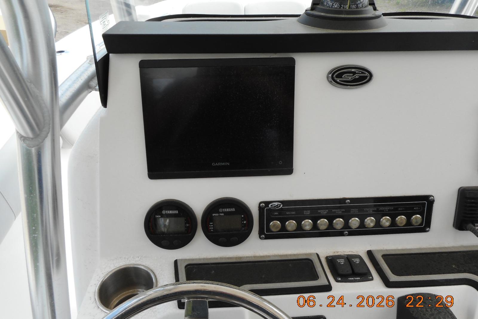 2022 Sea Fox 228 Commander dashboard with Garmin display and Yamaha gauges.