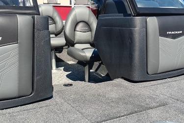 2026 Tracker Targa V-19 Combo boat interior with gray seating and carpeted flooring.