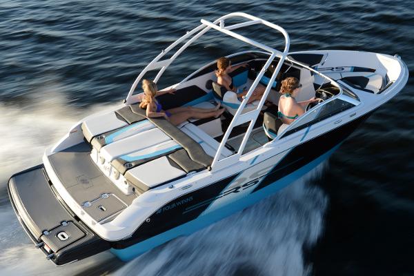 Manufacturer Provided Image: 2016 Four Winns H200RS speedboat cruising with passengers on a sunny day.