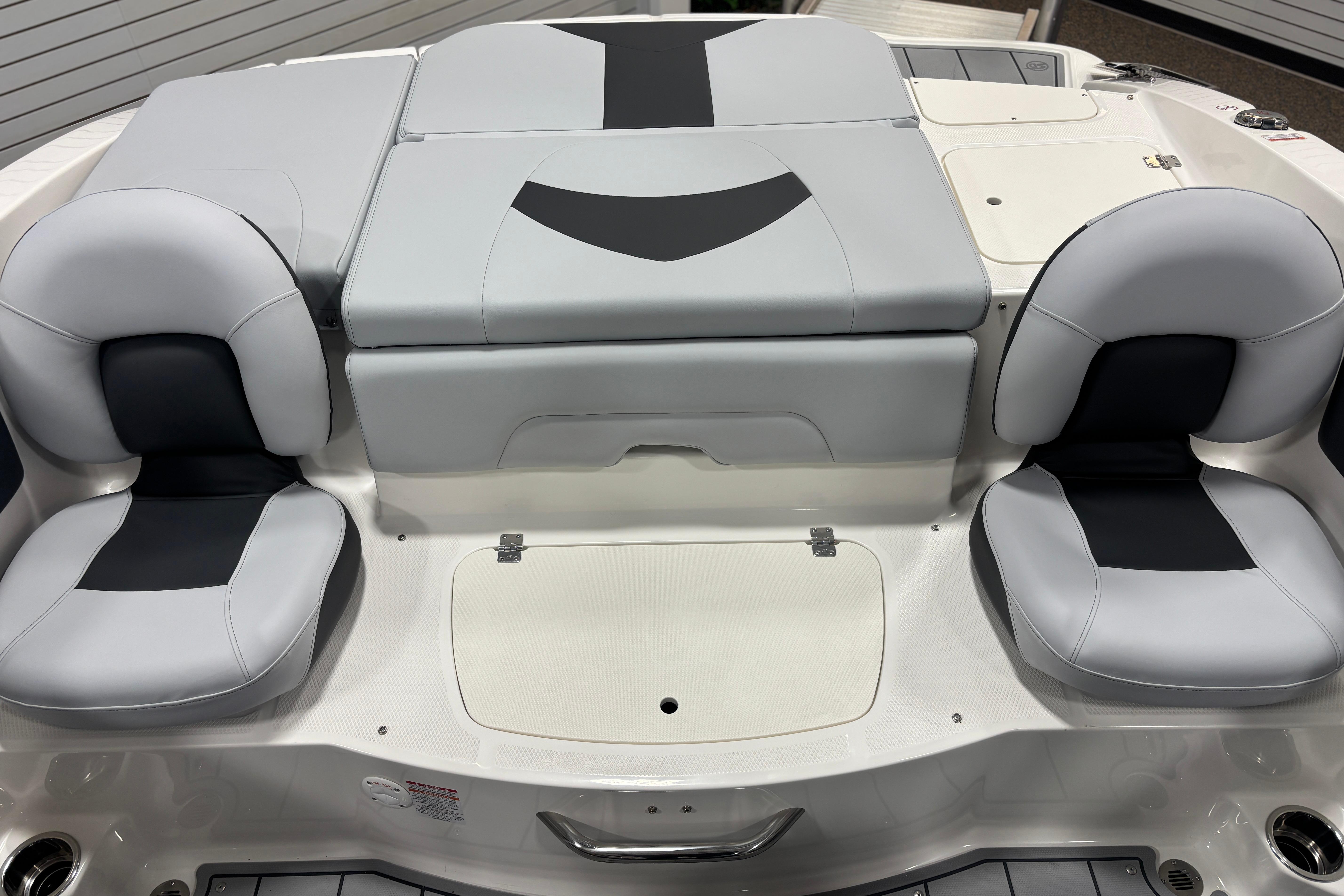 Interior of 2026 Chaparral 21 SSi Ski & Fish with gray seating.
