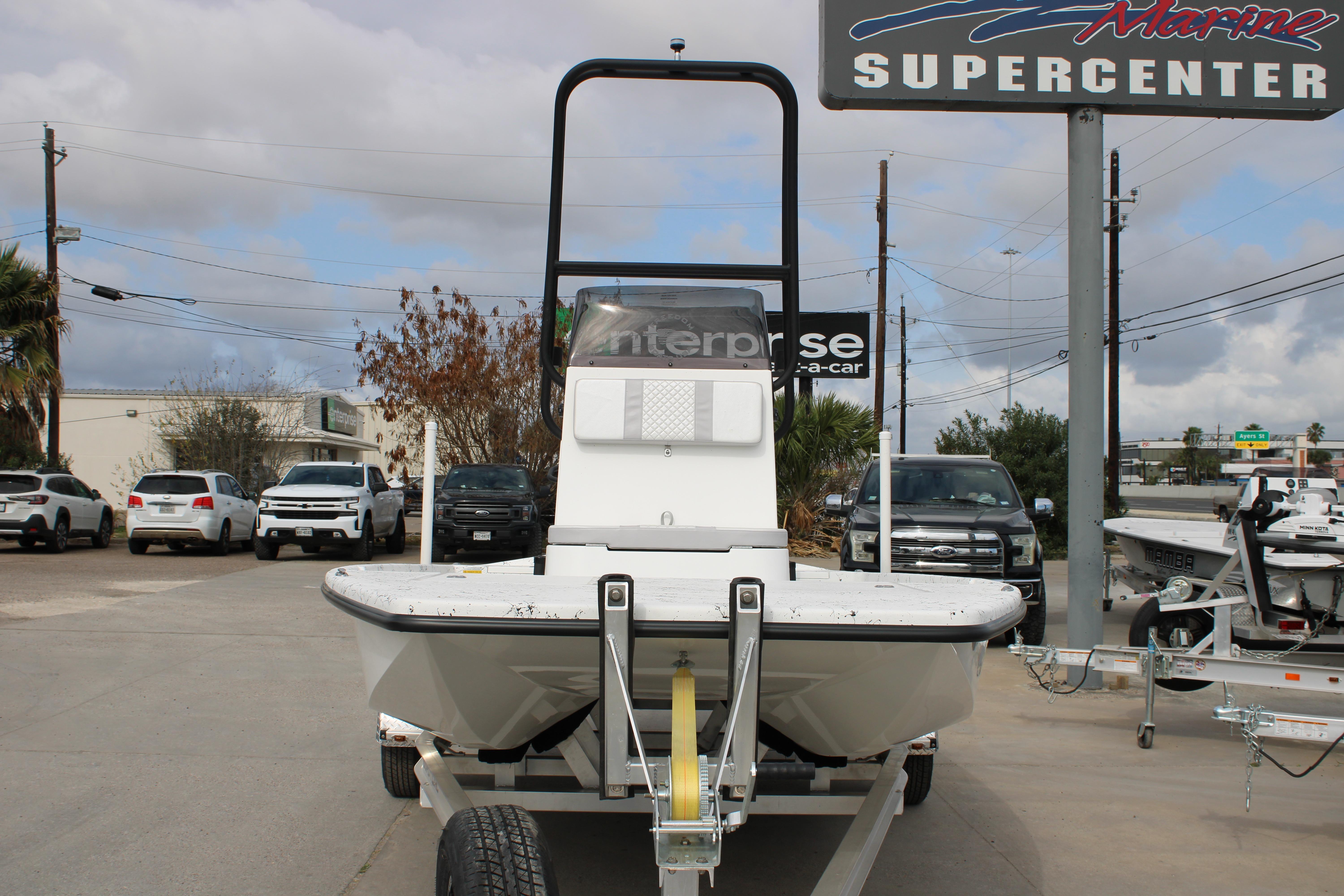 2026 Freedom Boats 19 PATRIOT on trailer at marine supercenter.