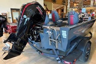 2026 Ranger VS1682SC Angler boat with powerful outboard motor in showroom setting.