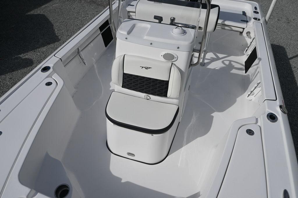 2026 Tidewater 1910 Bay Max boat interior with seating and console, showcasing sleek design.