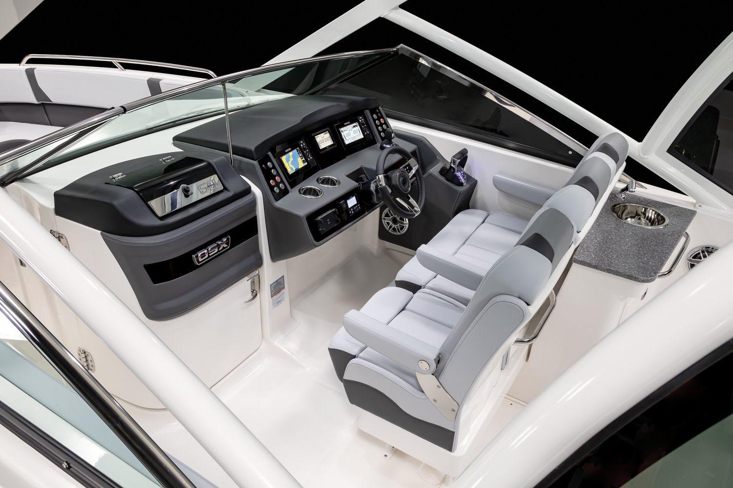 Manufacturer Provided Image: 2025 Chaparral 280 OSX boat interior with modern dashboard and seating.