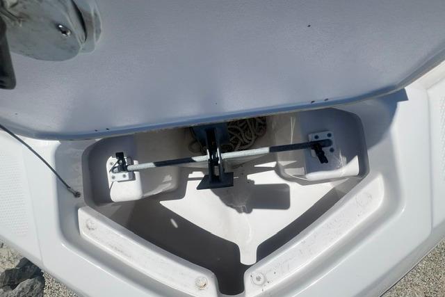 2019 Yamaha Boats 190 FSH Sport anchor storage compartment, featuring a clean, organized layout.