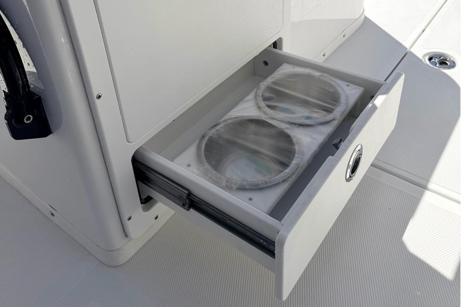 Sea Hunt Ultra 305 Coffin Box 2026 with open storage compartment.