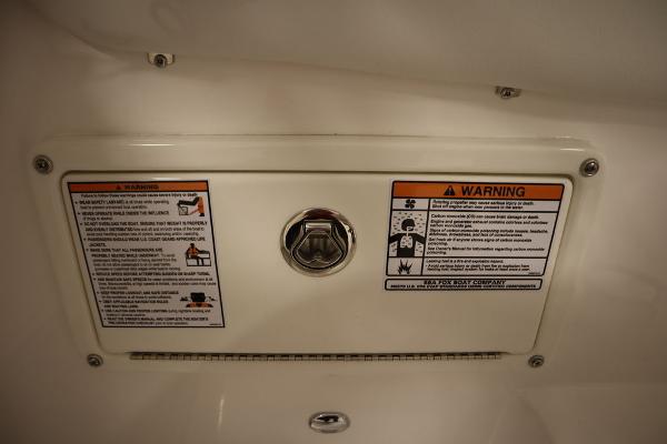 Warning labels on 2025 Sea Fox 228 Traveler boat panel.