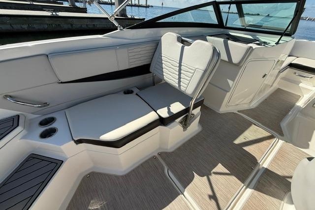 2022 Sea Ray SPX 210 Outboard interior with sleek seating and modern design.