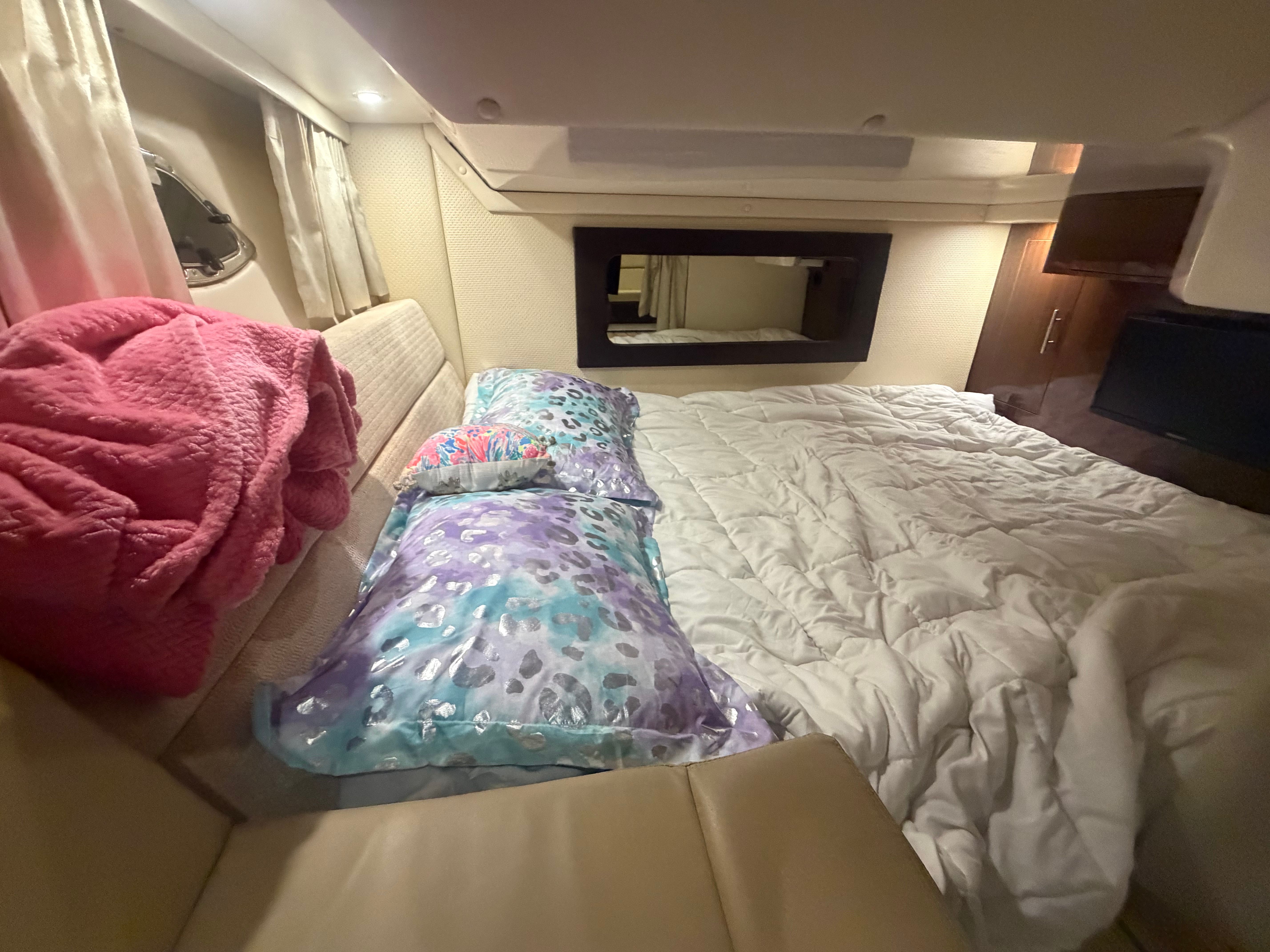 Interior of 2015 Regal 35 Sport Coupe with cozy bed.