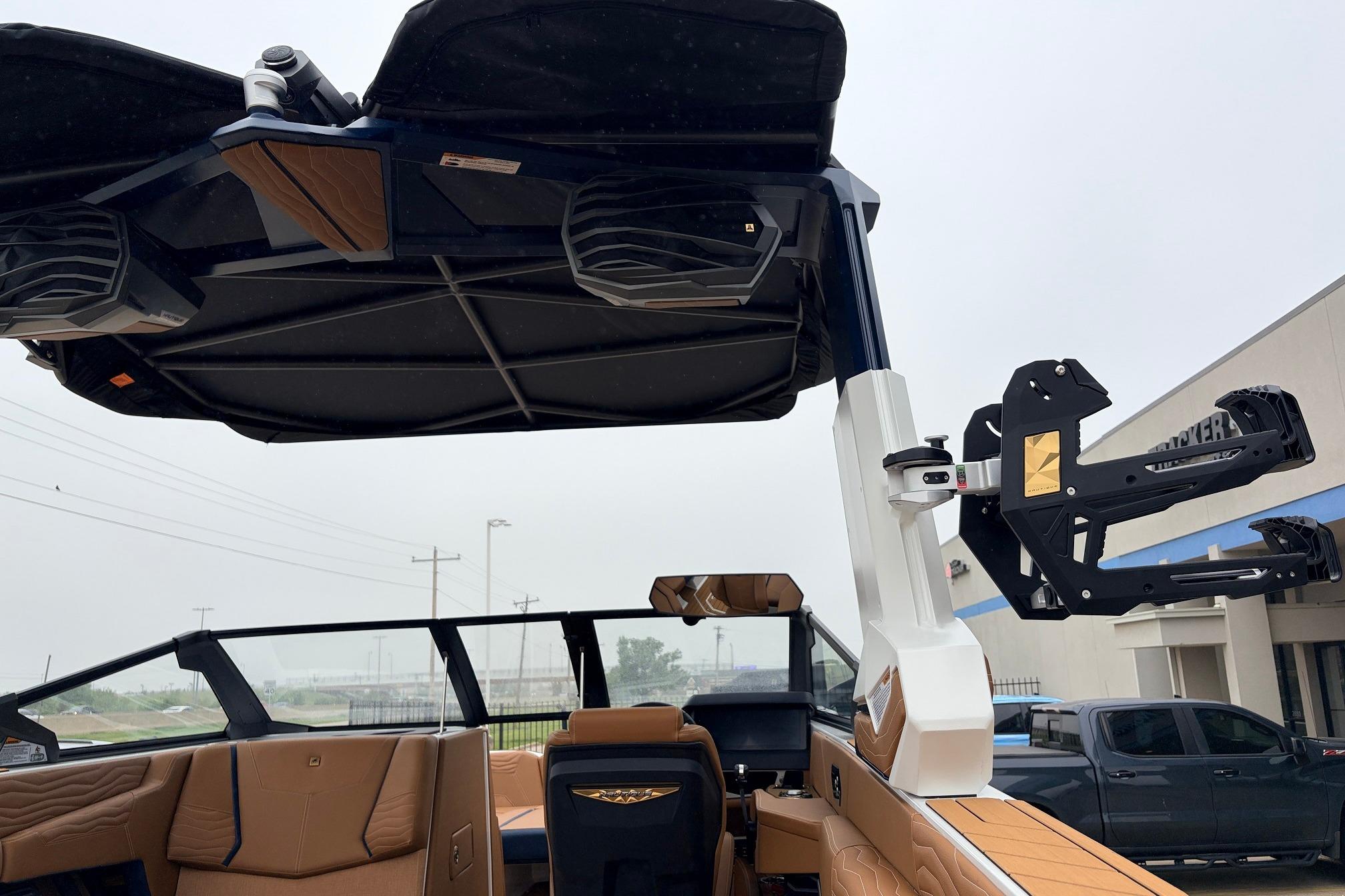 2026 Nautique Super Air Nautique G25 interior with advanced wakeboard tower and premium seating.