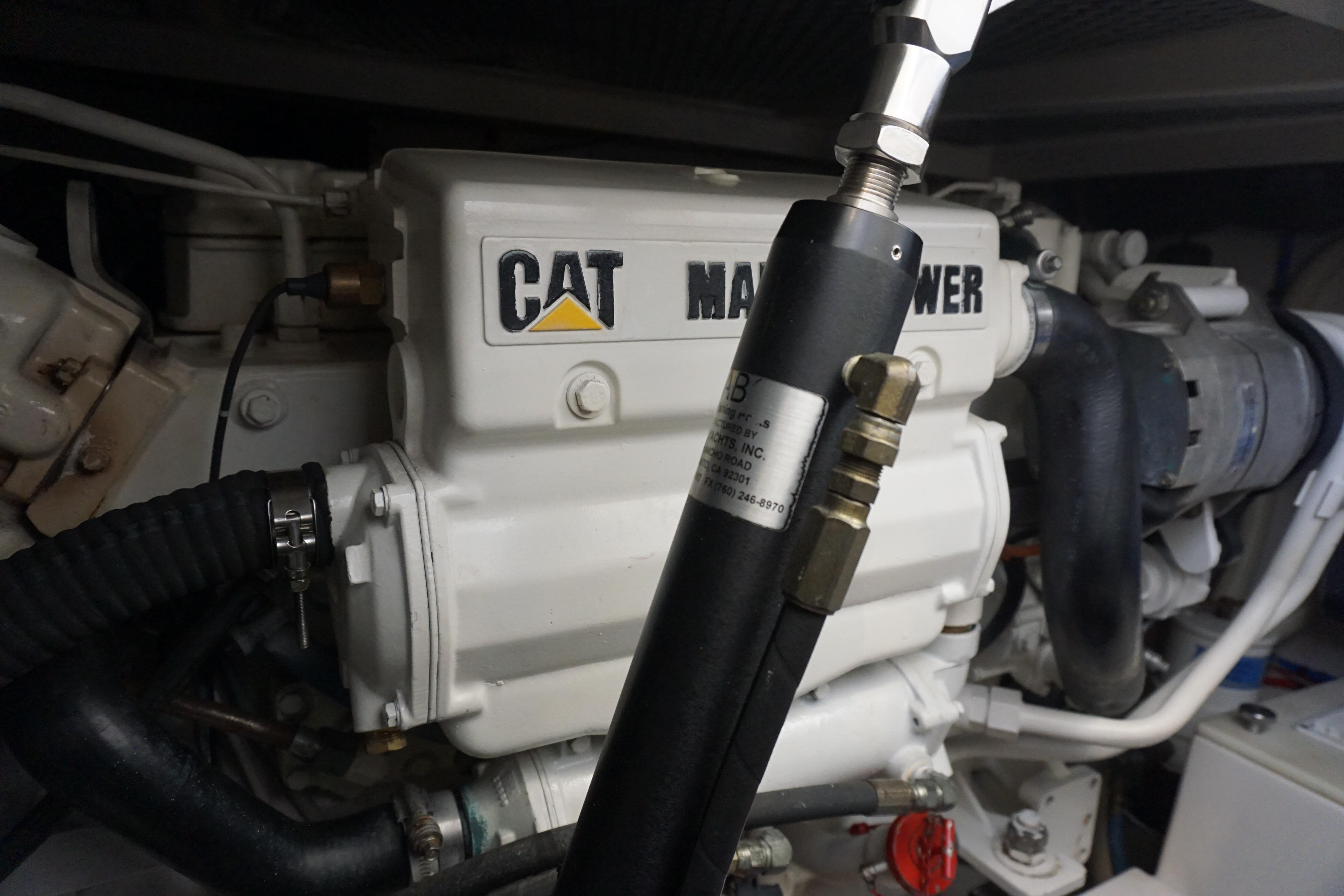 Engine room of 2005 Cabo 35 Express with CAT marine power engine.