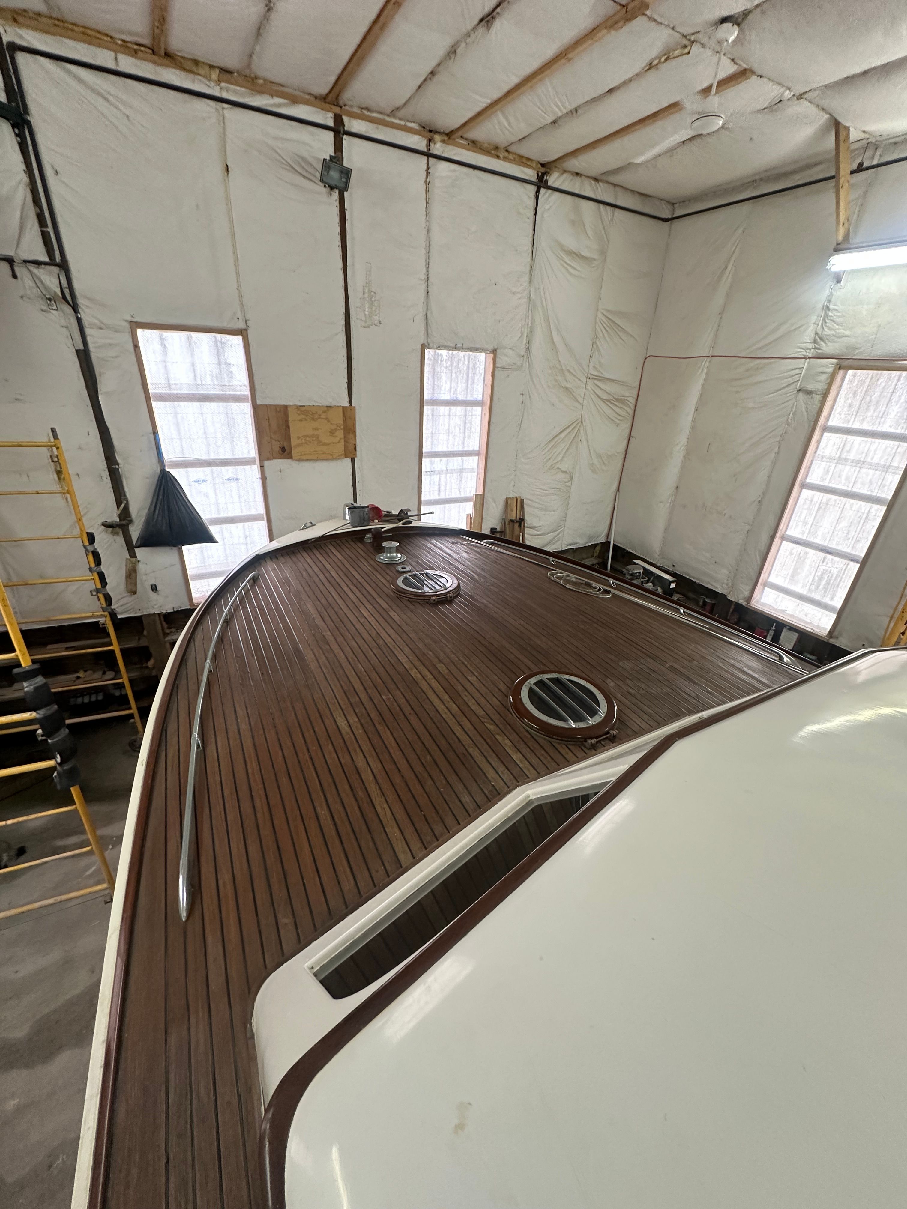 1951 Chris-Craft 50 Catalina in a workshop.