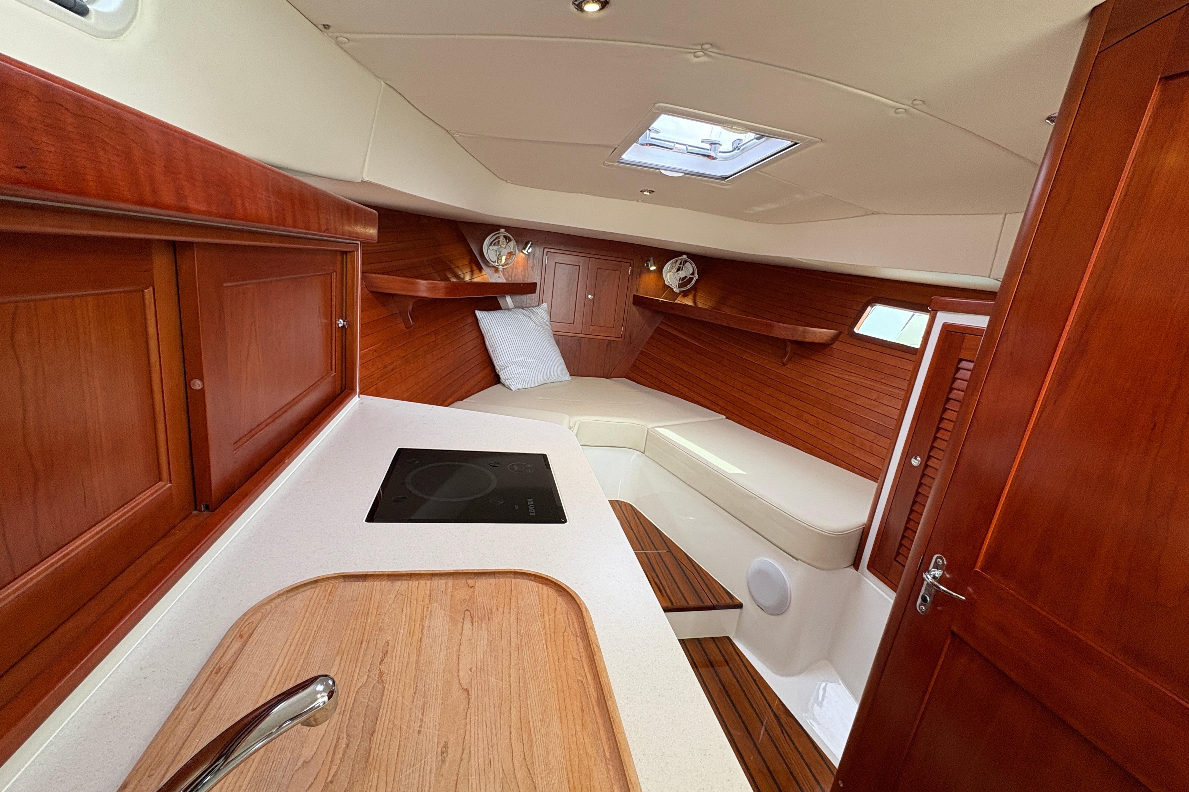 Luxurious 2023 MJM 35 yacht interior with wood finish and modern amenities.