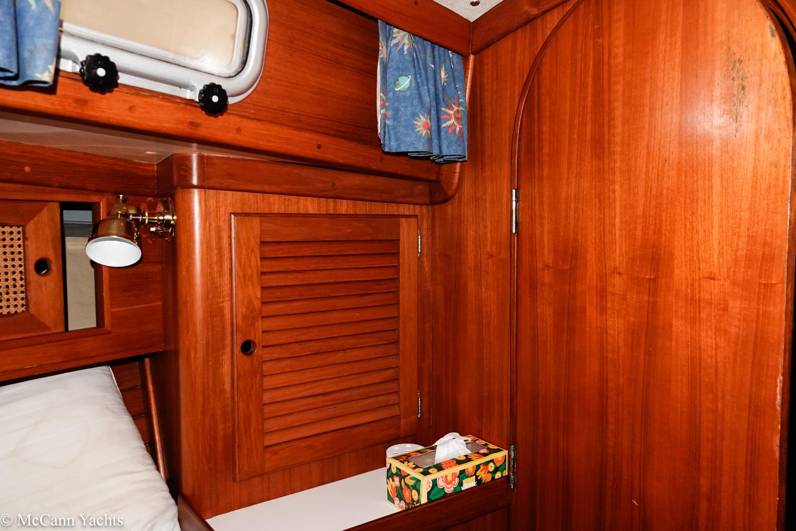 1988 Bristol 41.1 Aft Cockpit interior with wooden cabinetry and nautical decor.