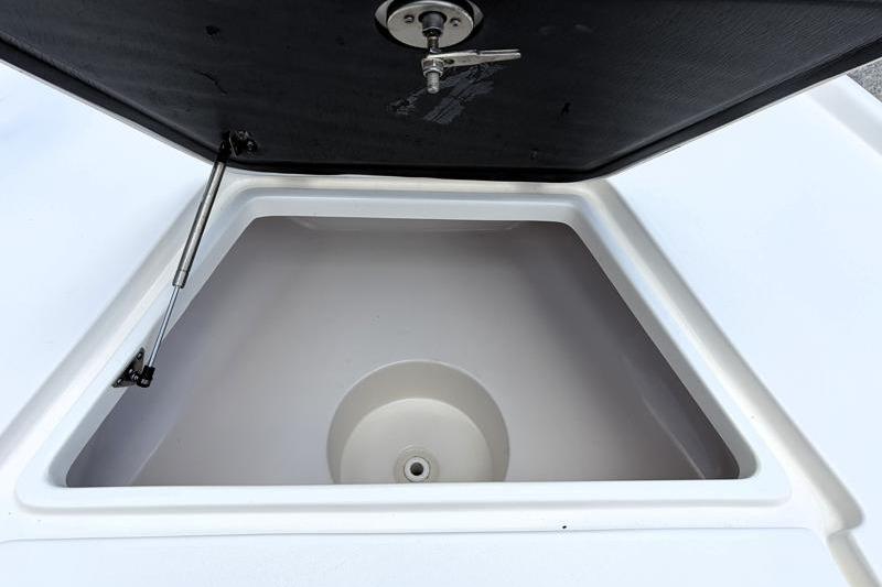 Open storage compartment on 2025 Key West 210 Bay Reef boat.