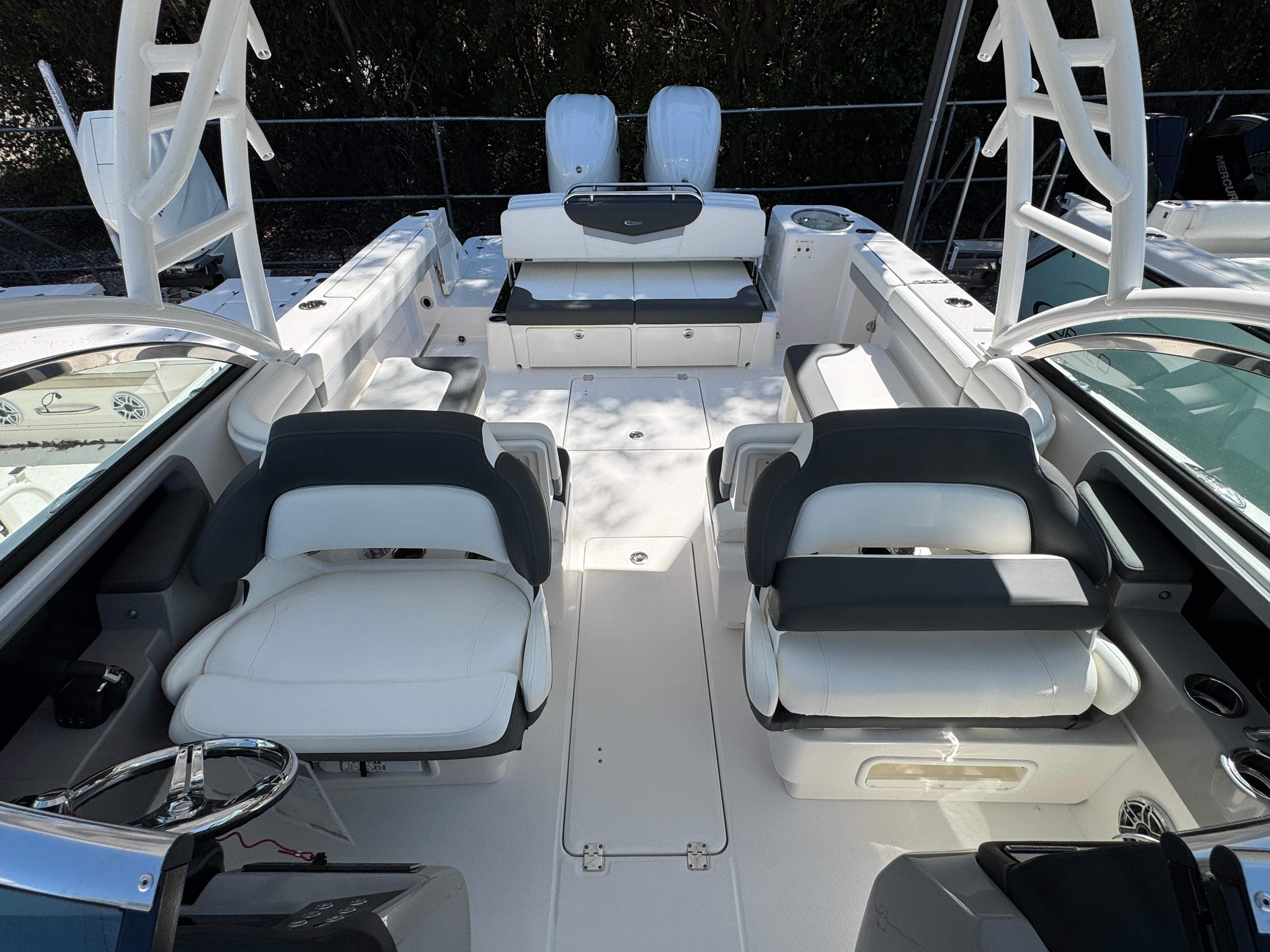2024 Robalo R317 boat interior with white seating and modern design.