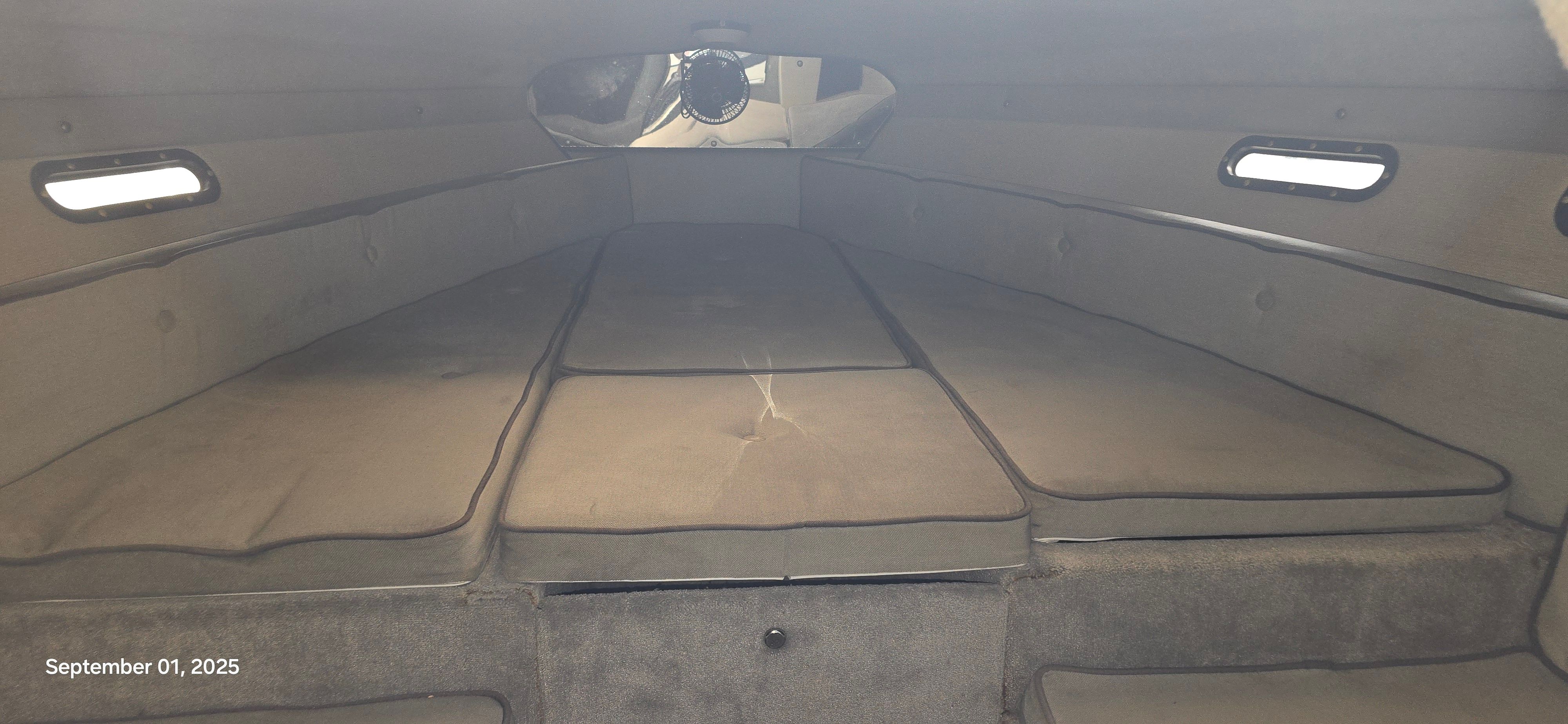 Interior of a 1989 Baja FORCE 235 with cushioned seating areas.