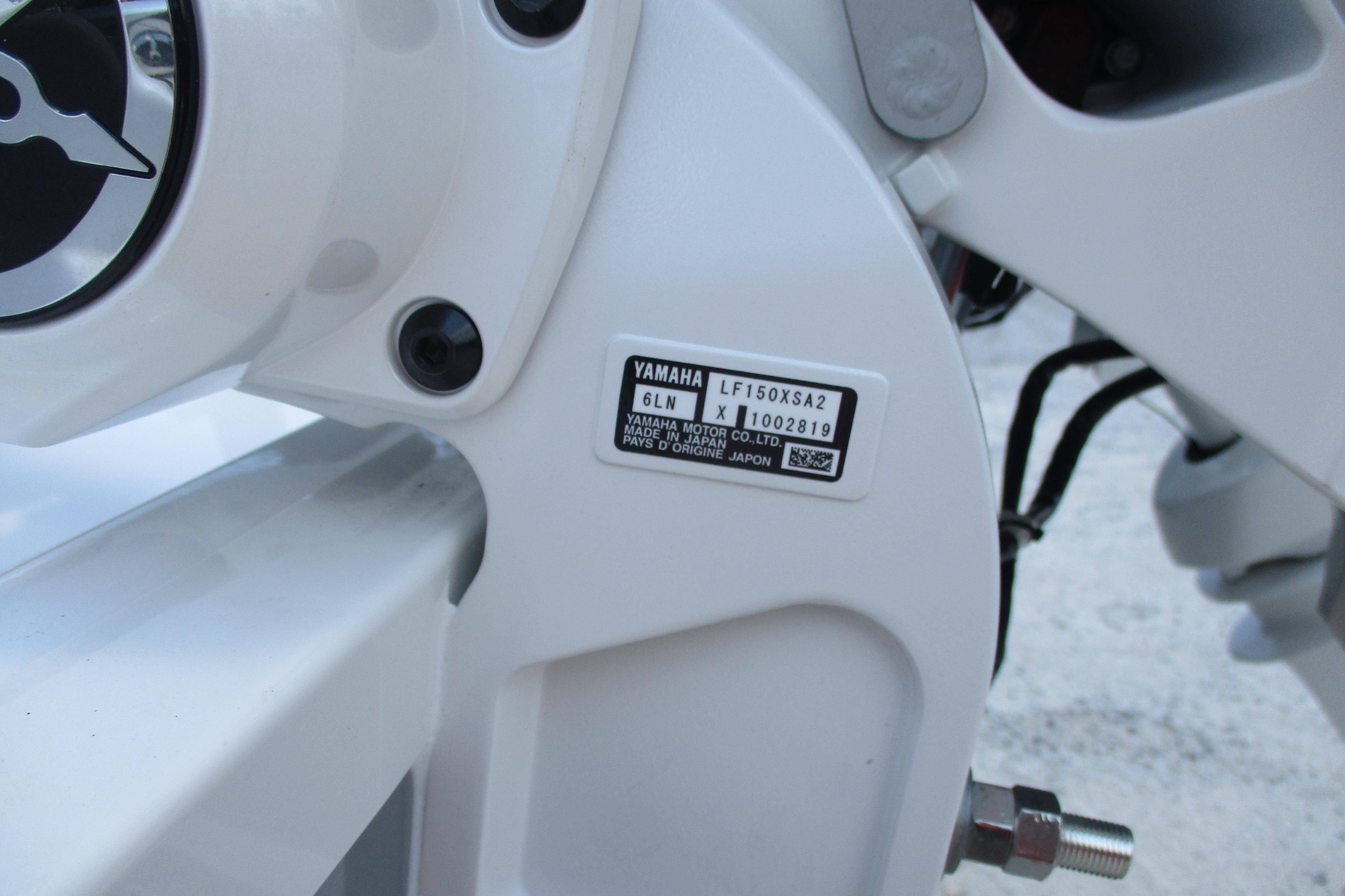 Close-up of Yamaha motor label on 2027 Sportsman Open 252 Center Console boat.