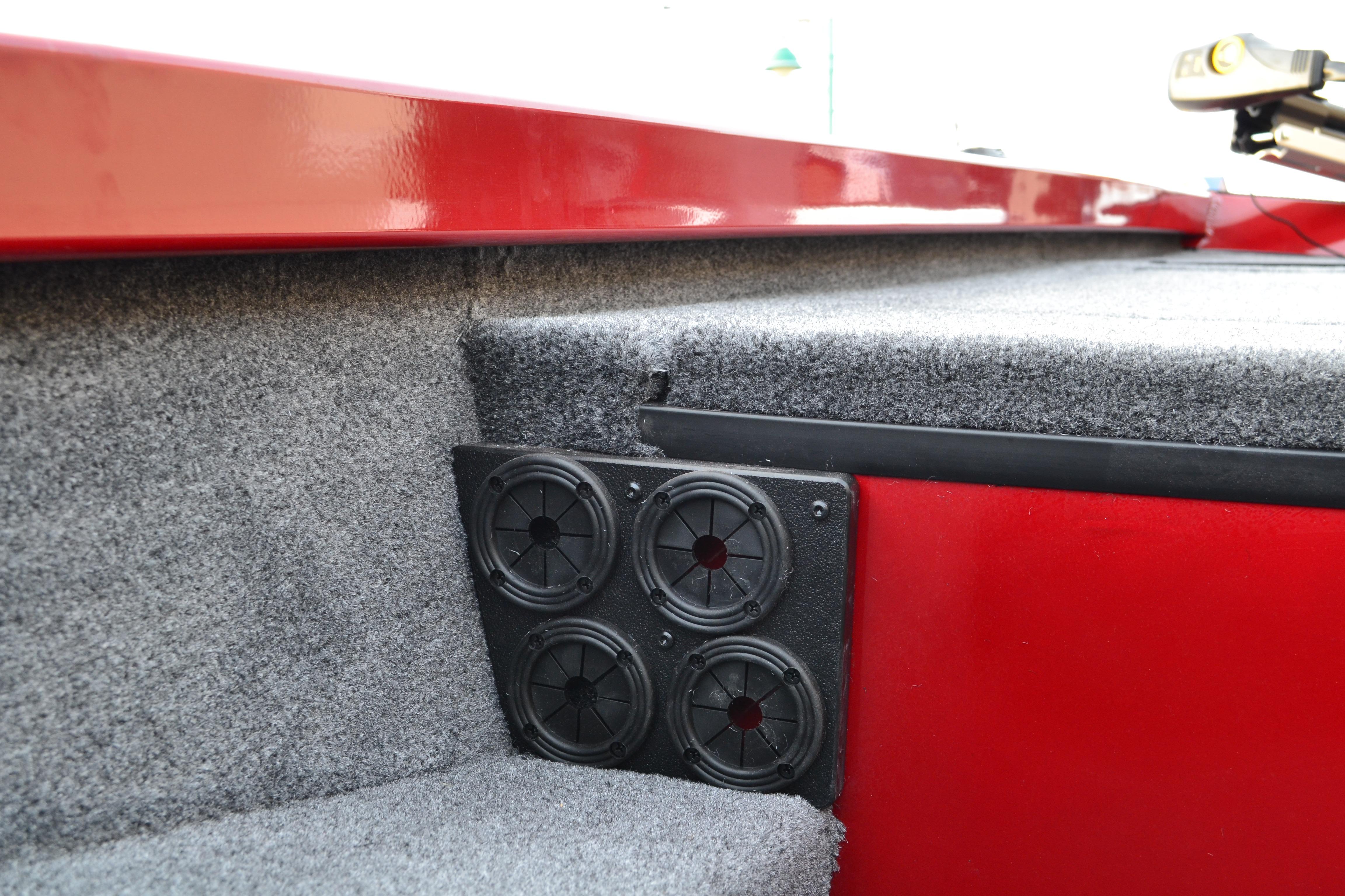 2026 Ranger RT188 boat interior with red and gray design, featuring speaker system.