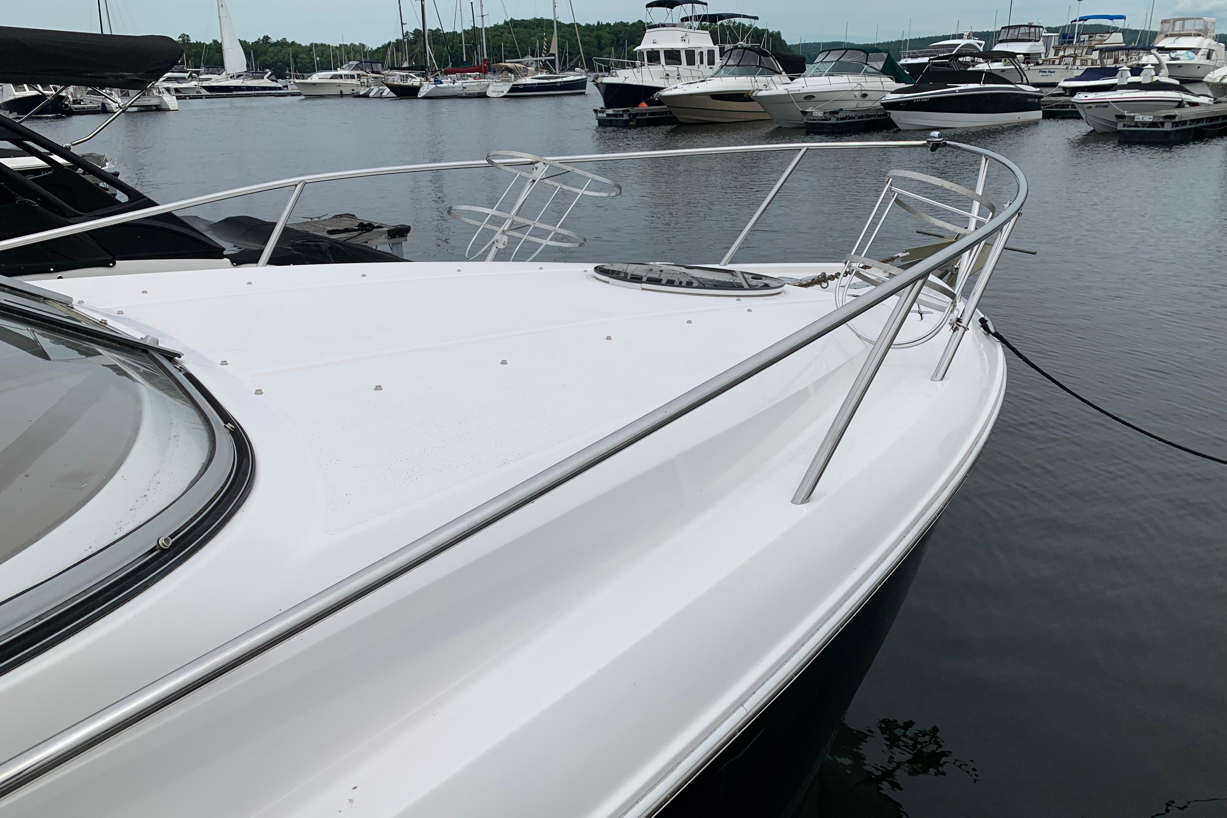 2017 Regal 26 Express boat docked at a marina with other vessels.