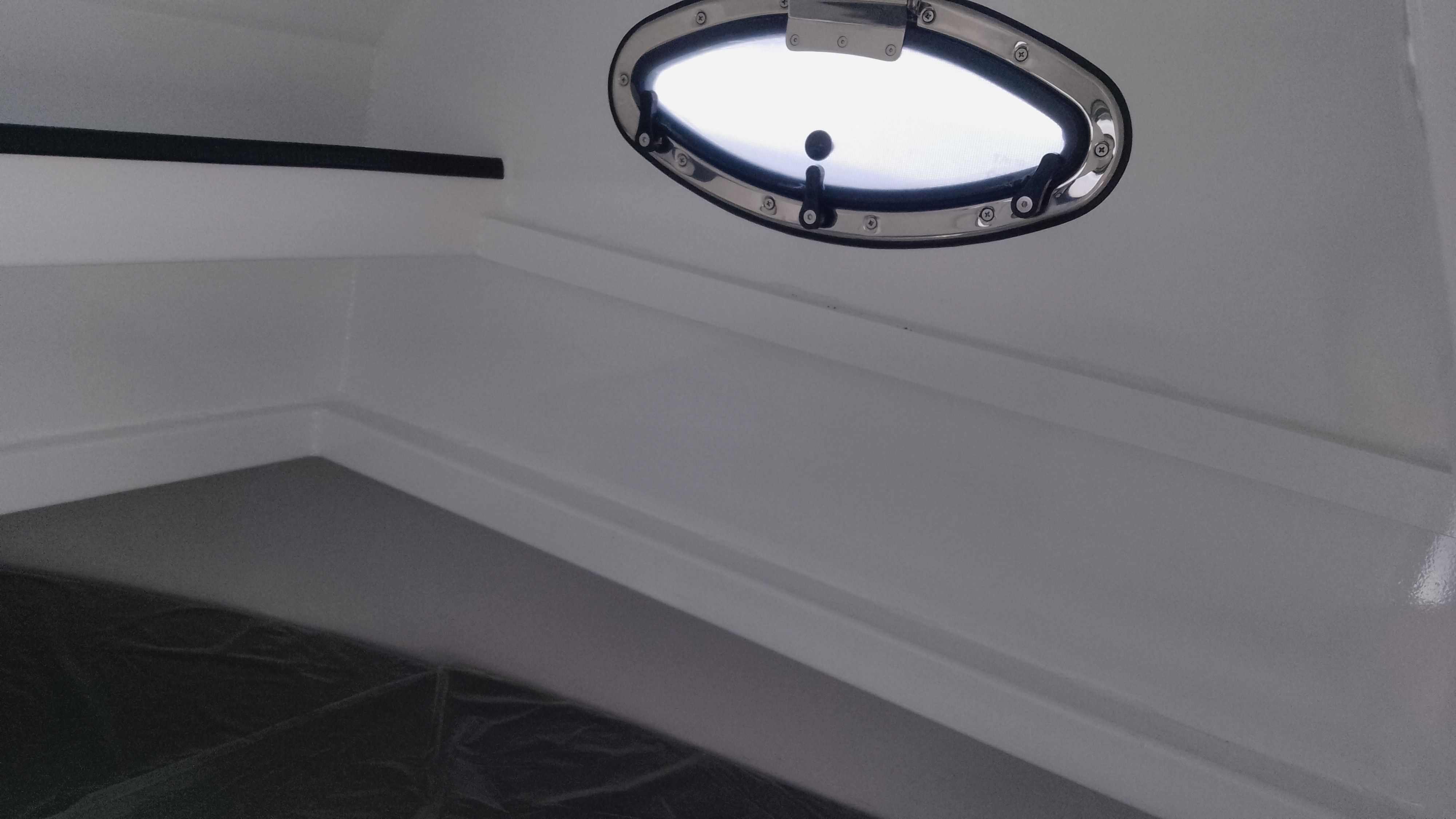 Interior of Gospel Boat 7.5M 2024 with porthole.