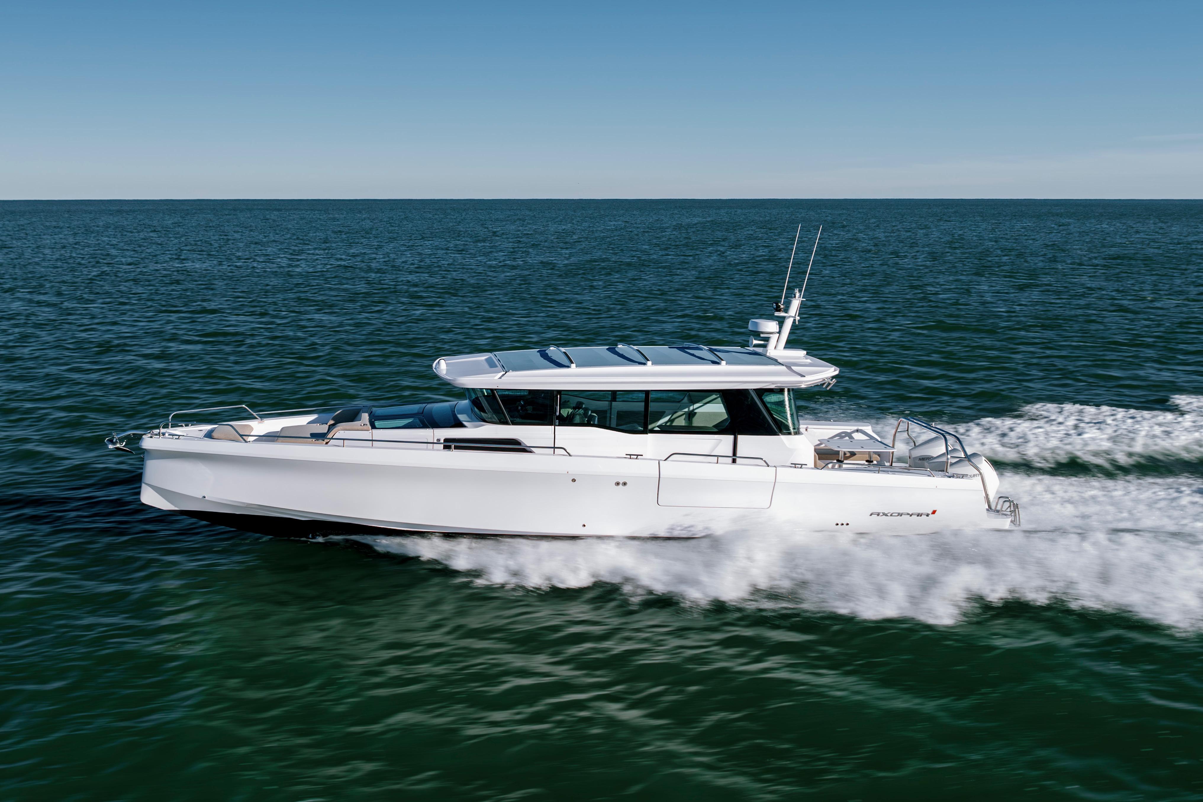 2027 Axopar 45 XC Cross Cabin cruising on open water.