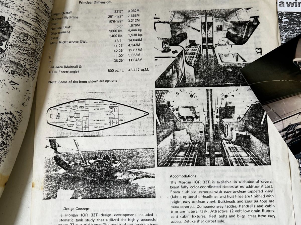 An old brochure displays the interior and design of a 1974 Morgan 33T sailboat.