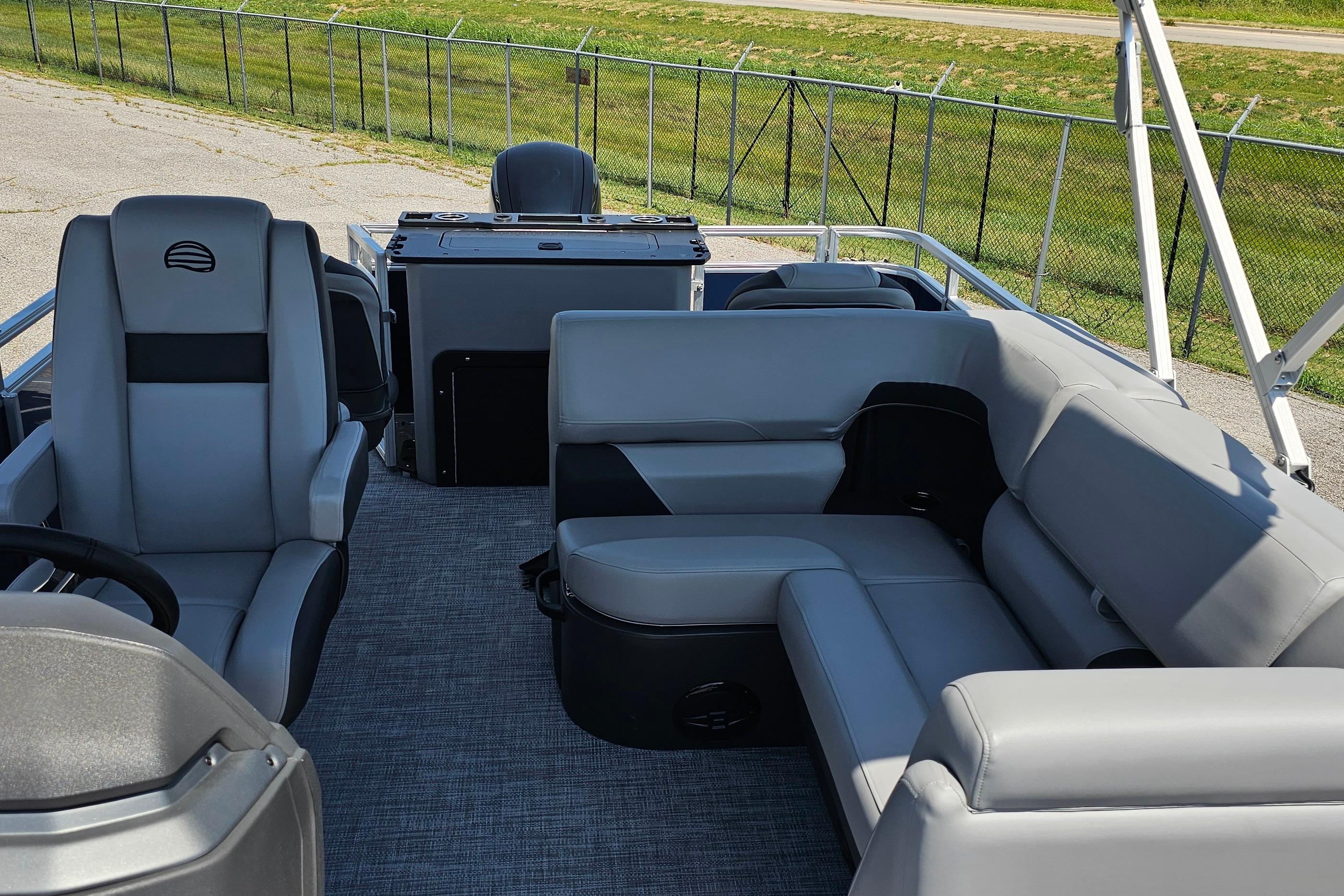 2026 Sun Tracker SportFish 20 DLX pontoon boat with spacious seating and modern design.