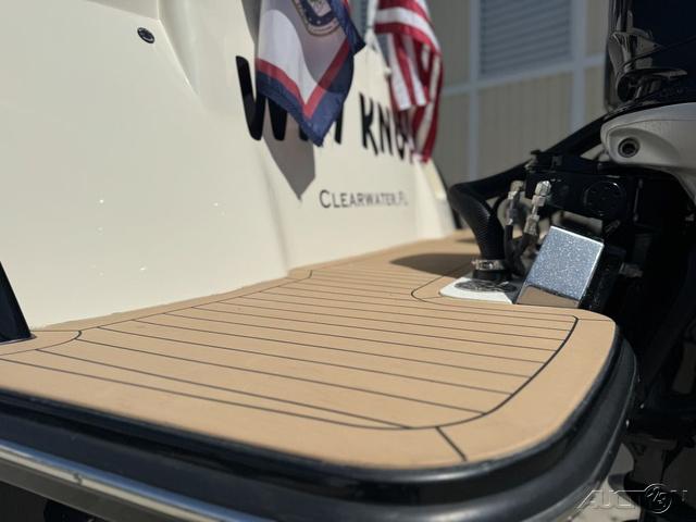 2022 Scout 330 LXF boat deck with flags and Clearwater branding.