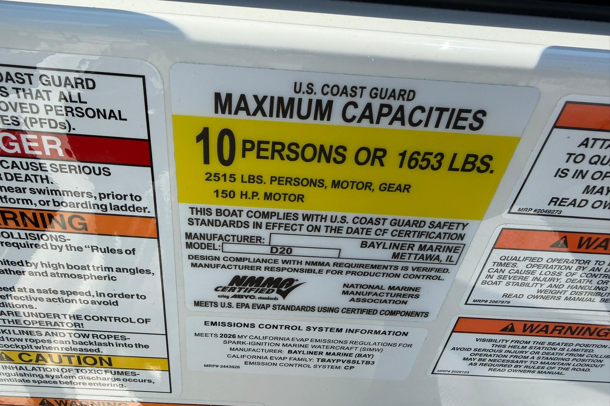 Bayliner D20 2026 boat capacity label, U.S. Coast Guard certified for 10 persons or 1653 lbs.