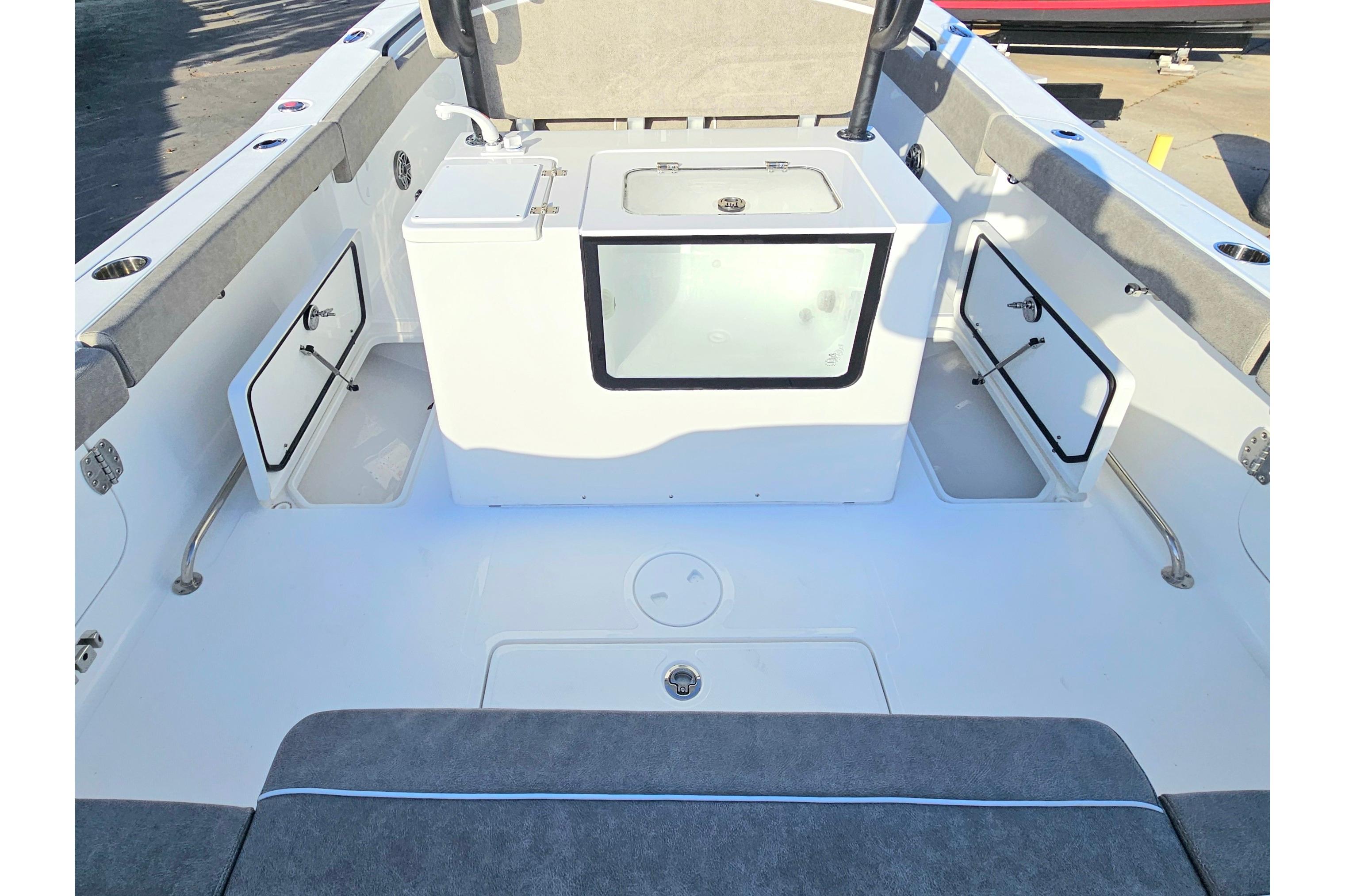 2026 Sea Hunt Ultra 285 SE boat interior with storage compartments and seating.